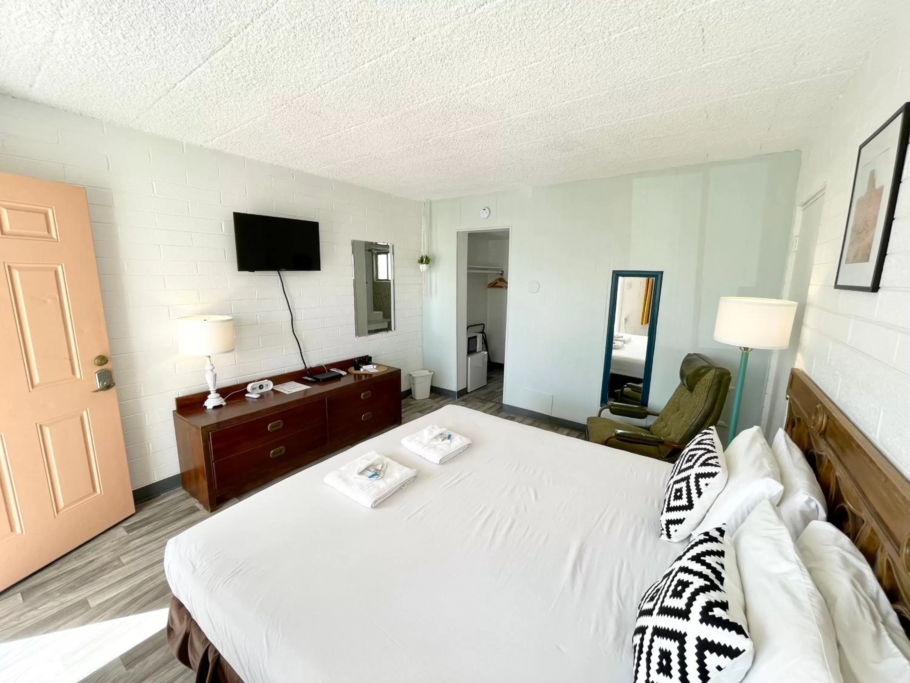 Bed in The Postcard Motel