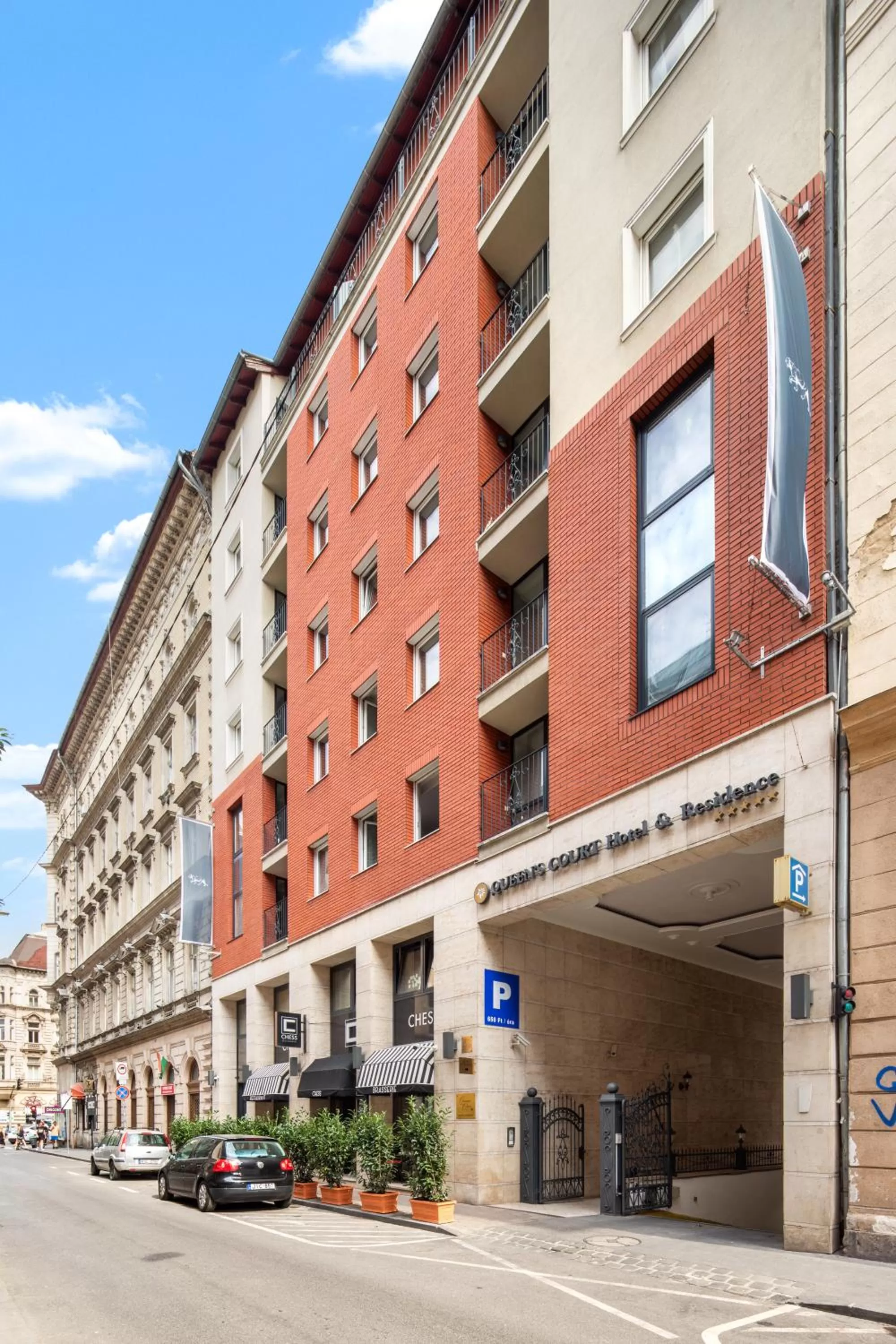 Property building in Queen's Court Hotel & Residence