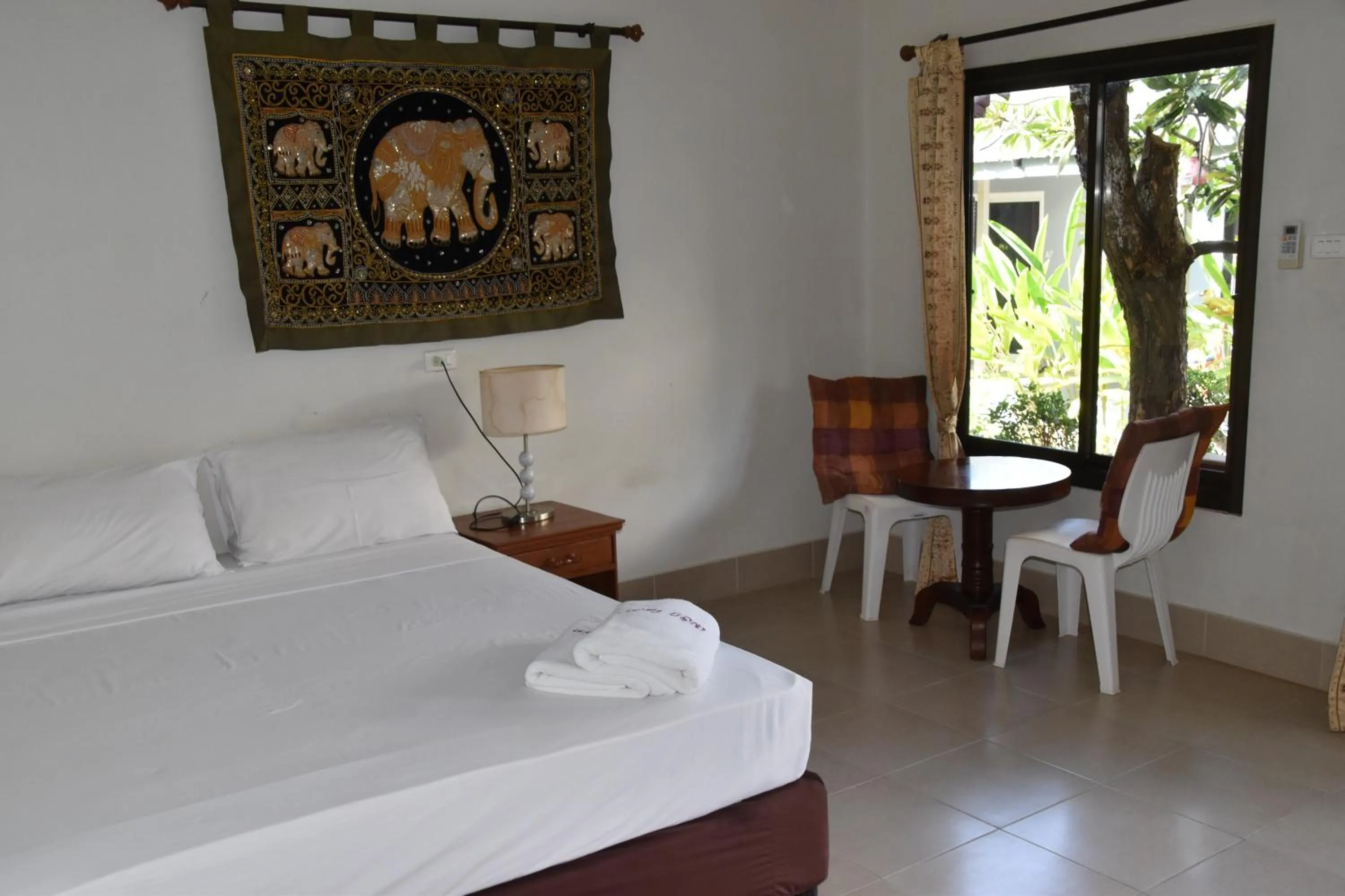 Photo of the whole room, Bed in Magic Resort