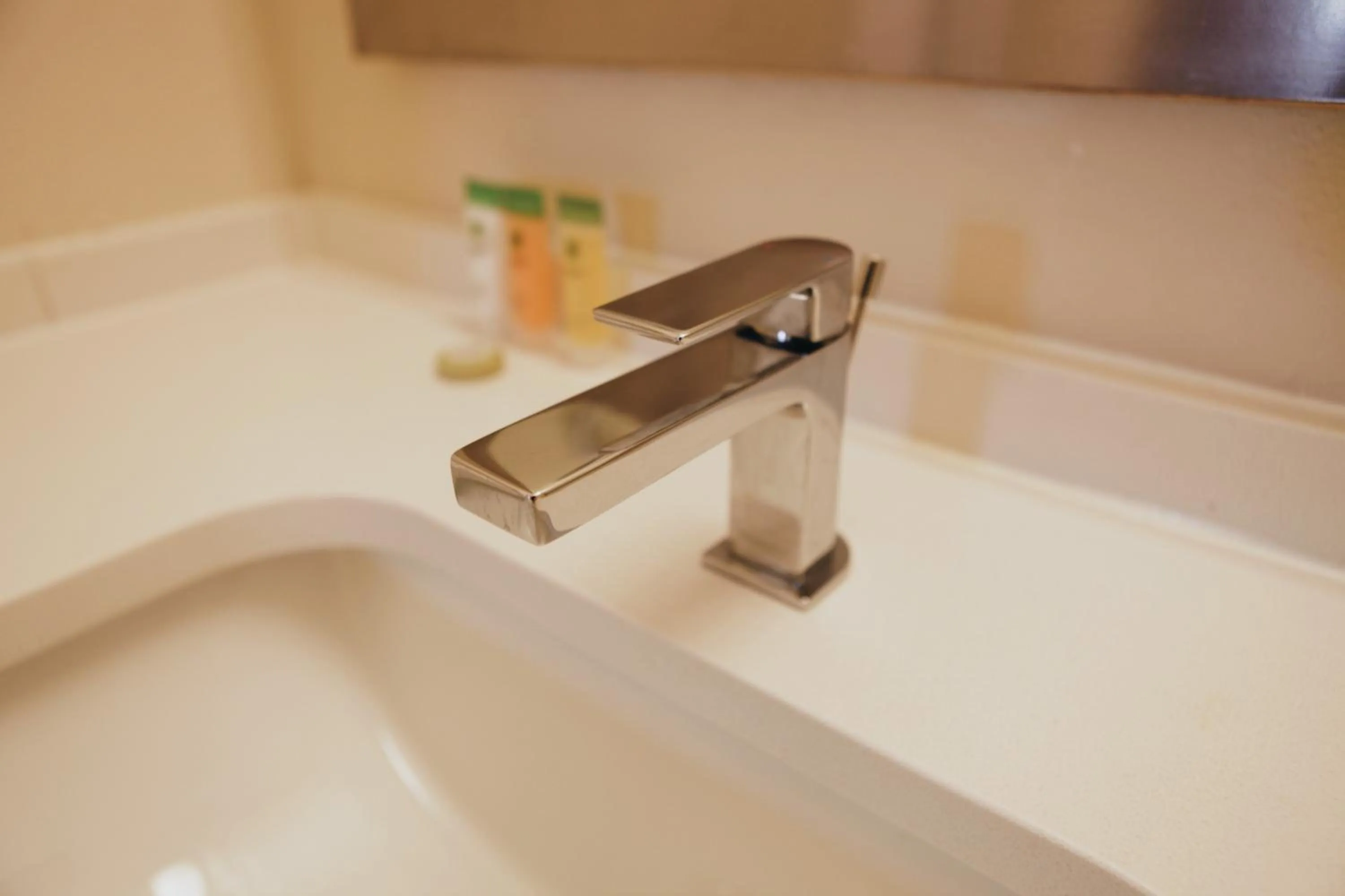 Bathroom in All Seasons Inn & Suites