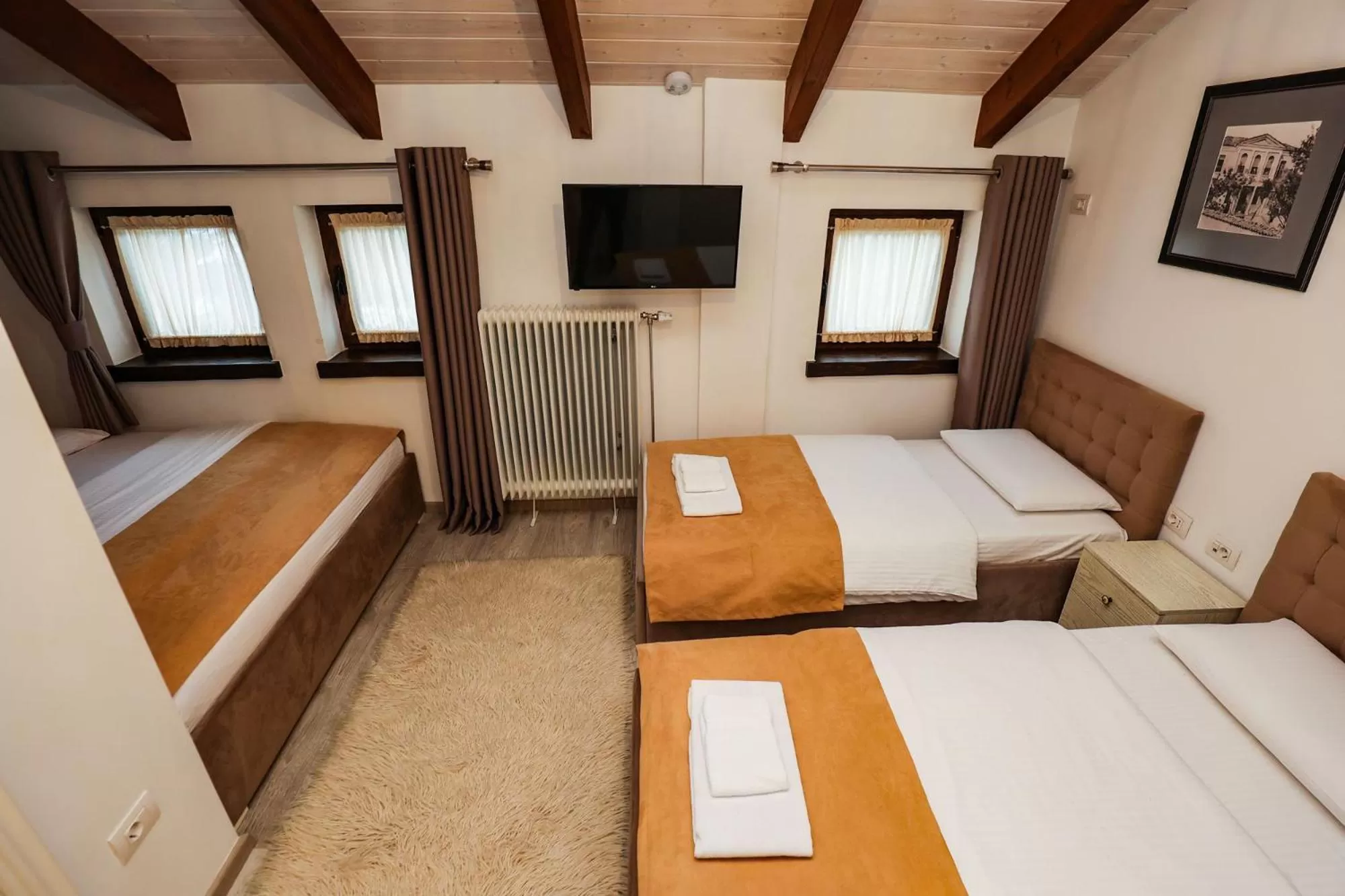 Photo of the whole room, Bed in Bujtina Oxhaku