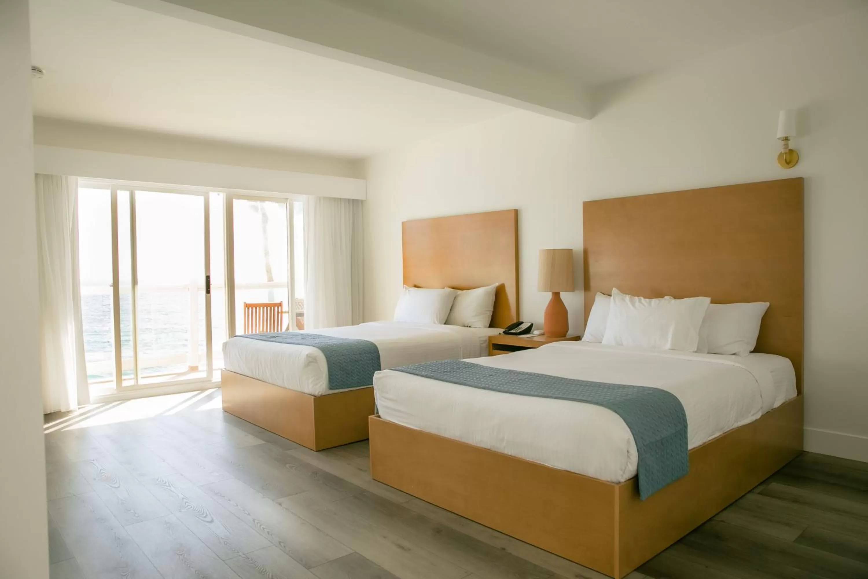 Bed in Capri Laguna on the Beach - A Boutique Hotel