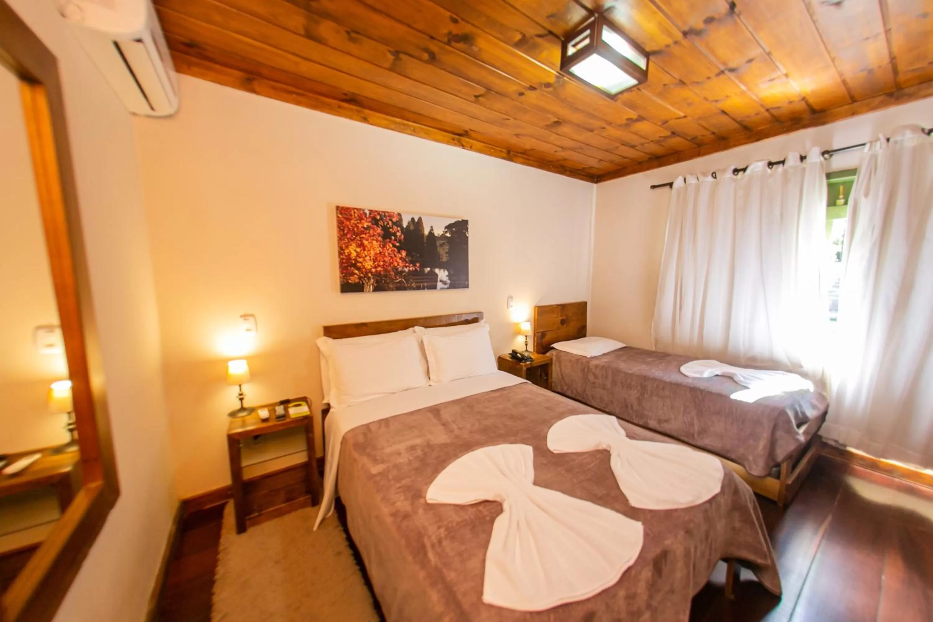 Bed in Pousada Charm Canela