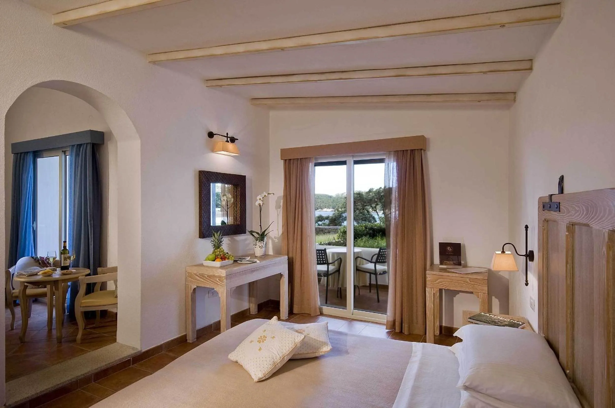 Day, Bed in COLONNA GRAND HOTEL CAPO TESTA, a Colonna Luxury Beach Hotel, Santa Teresa Sardegna