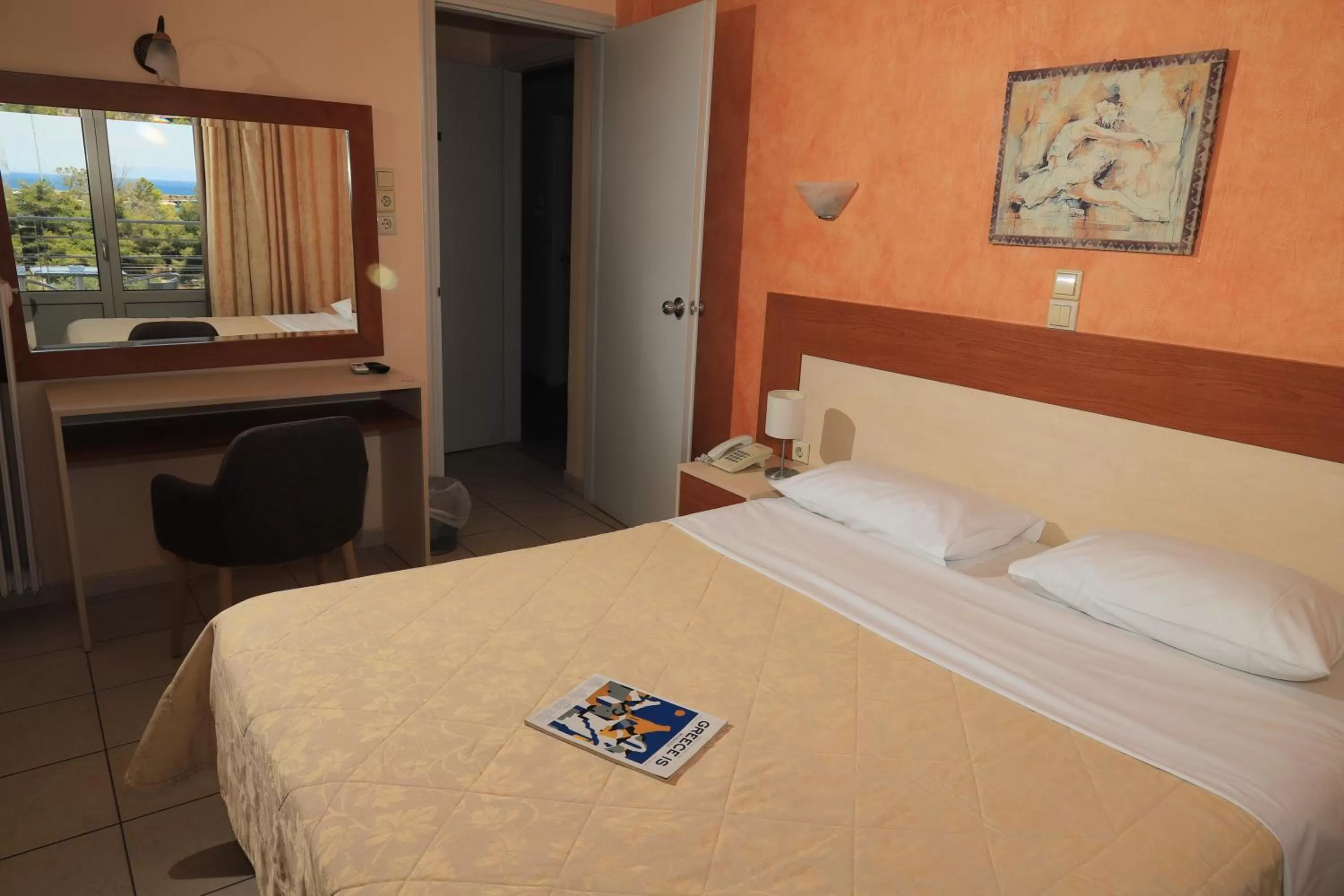 Bed in IKAROS Hotel ELLINIKO