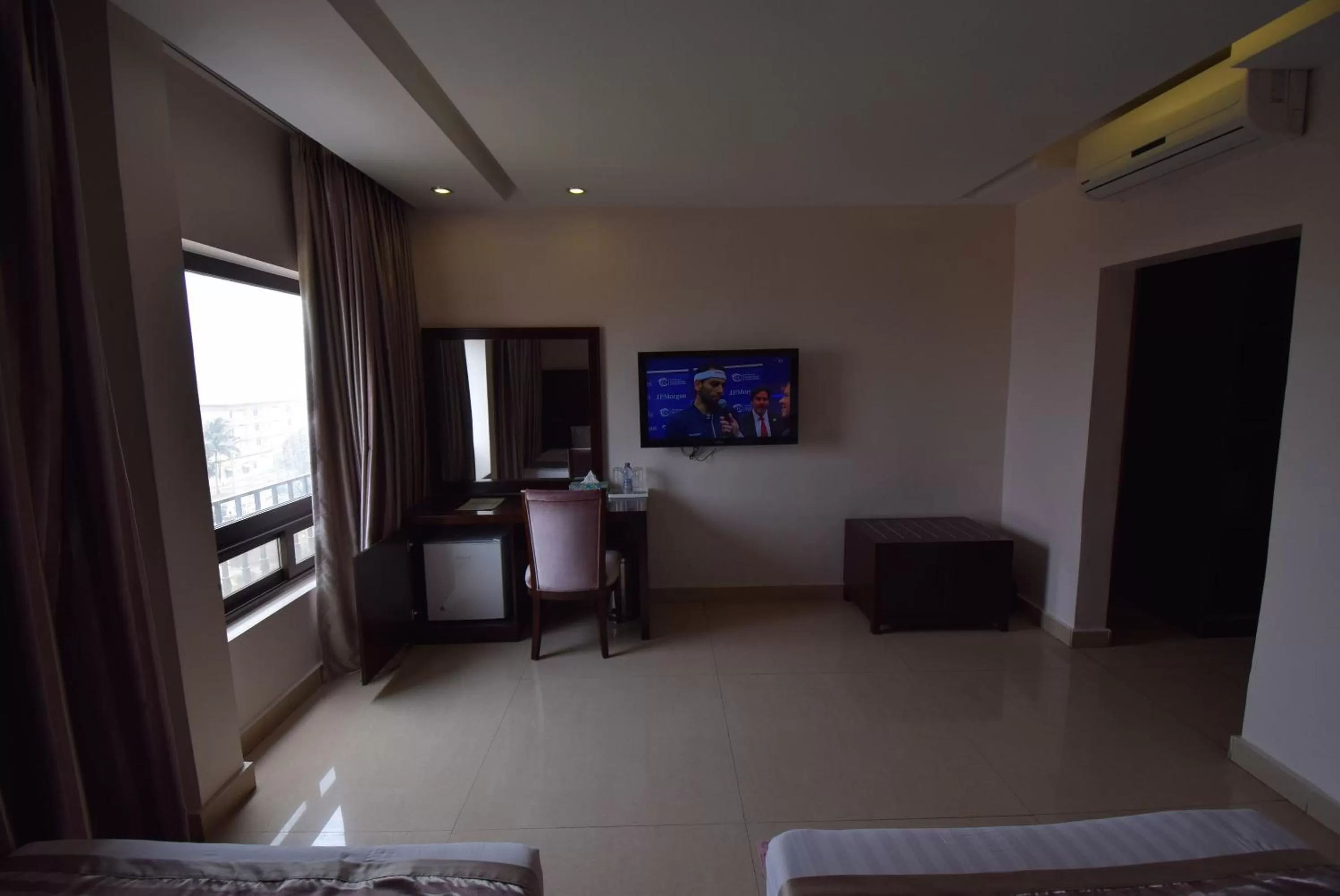 TV and multimedia, TV/Entertainment Center in Noble House Hotel
