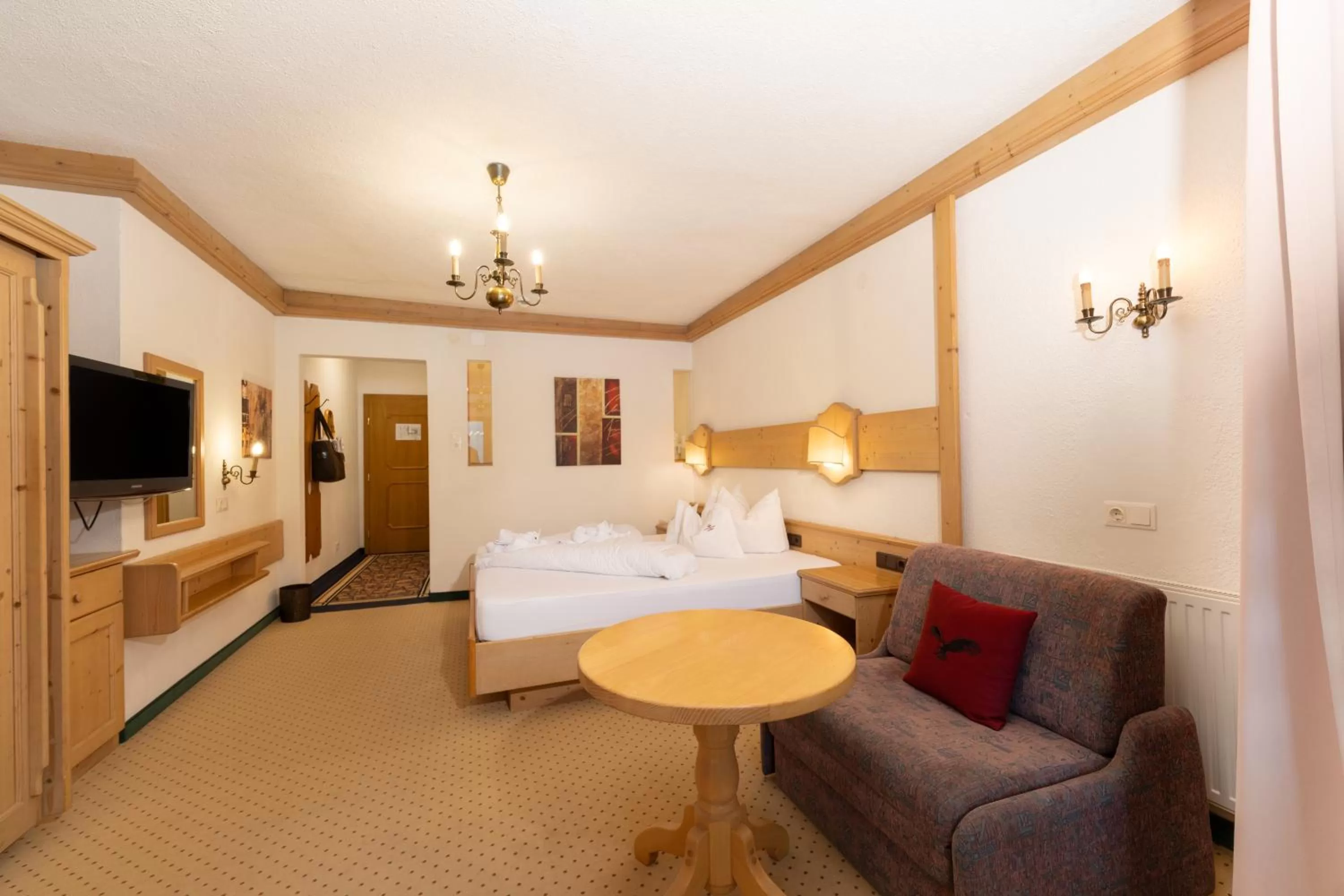 Photo of the whole room, Bed in Hotel Schwarzer Adler