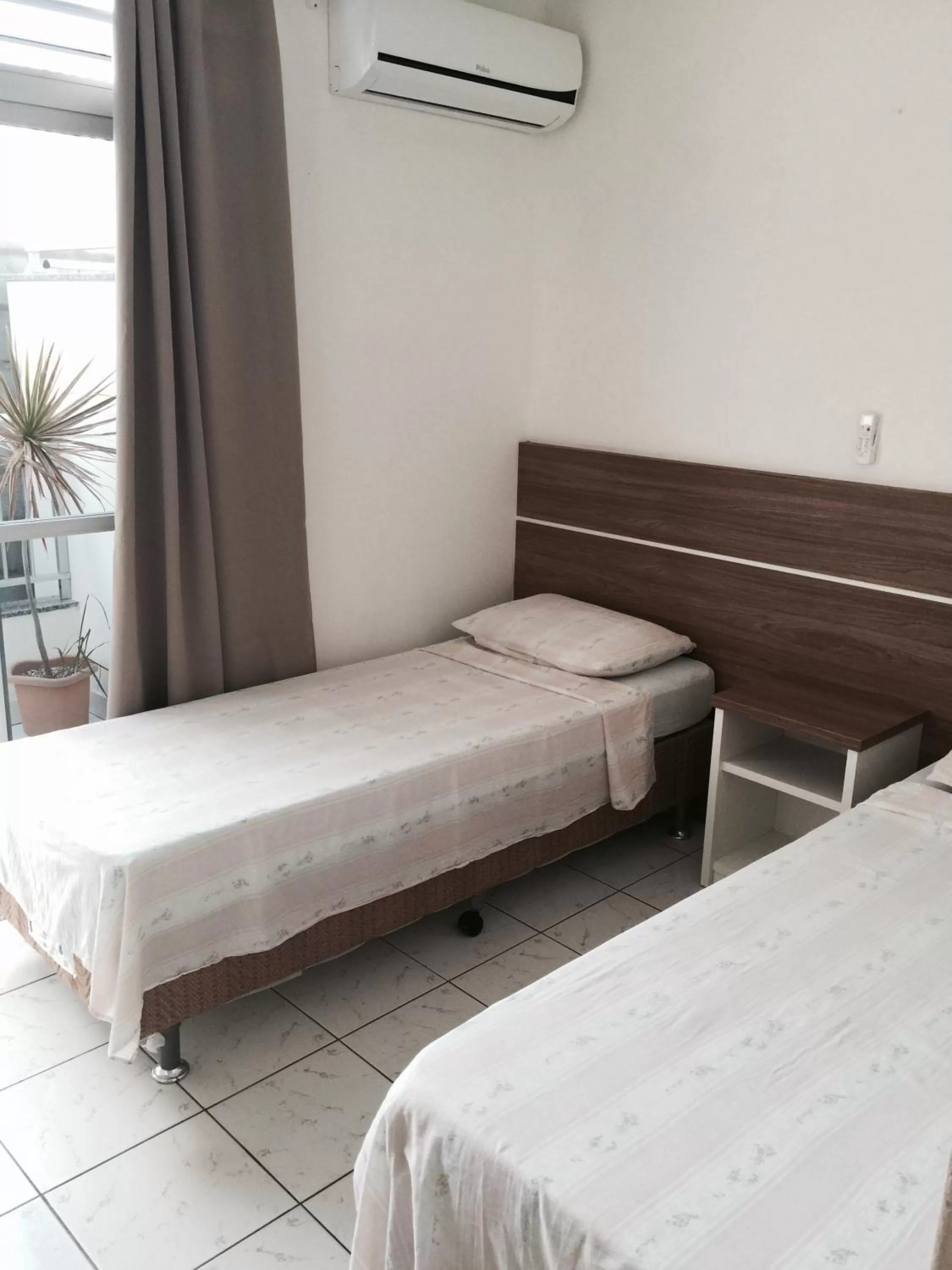 Bed in Pousada Almeida