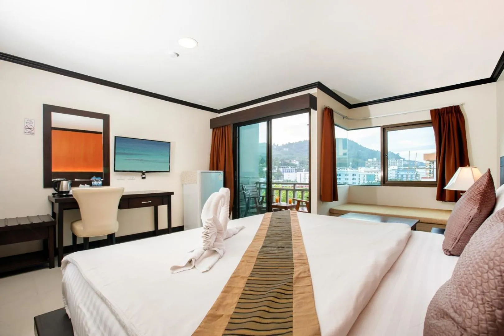 Bed in Orchid Garden Hotel Patong