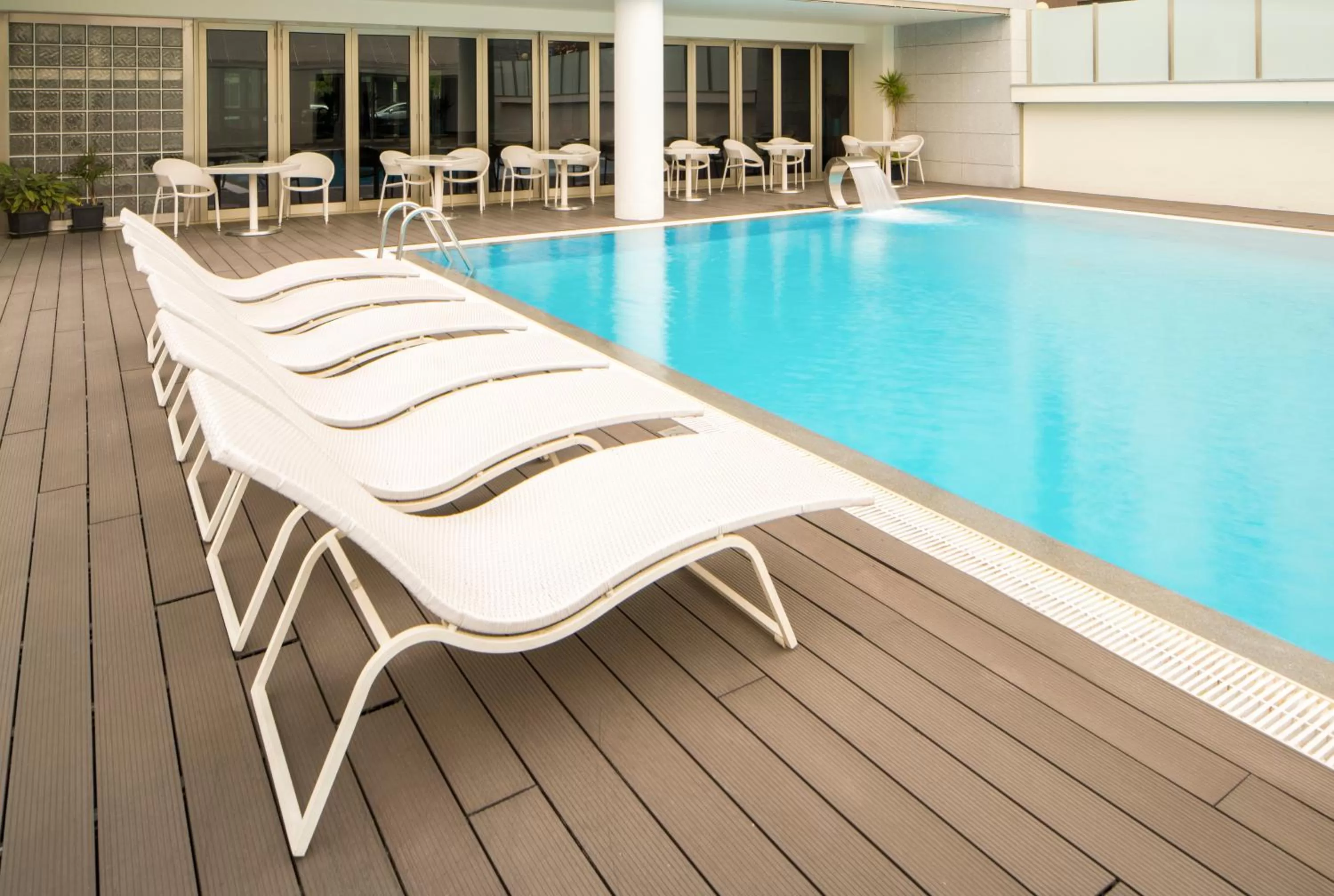 Pool view in NH Coimbra Dona Ines