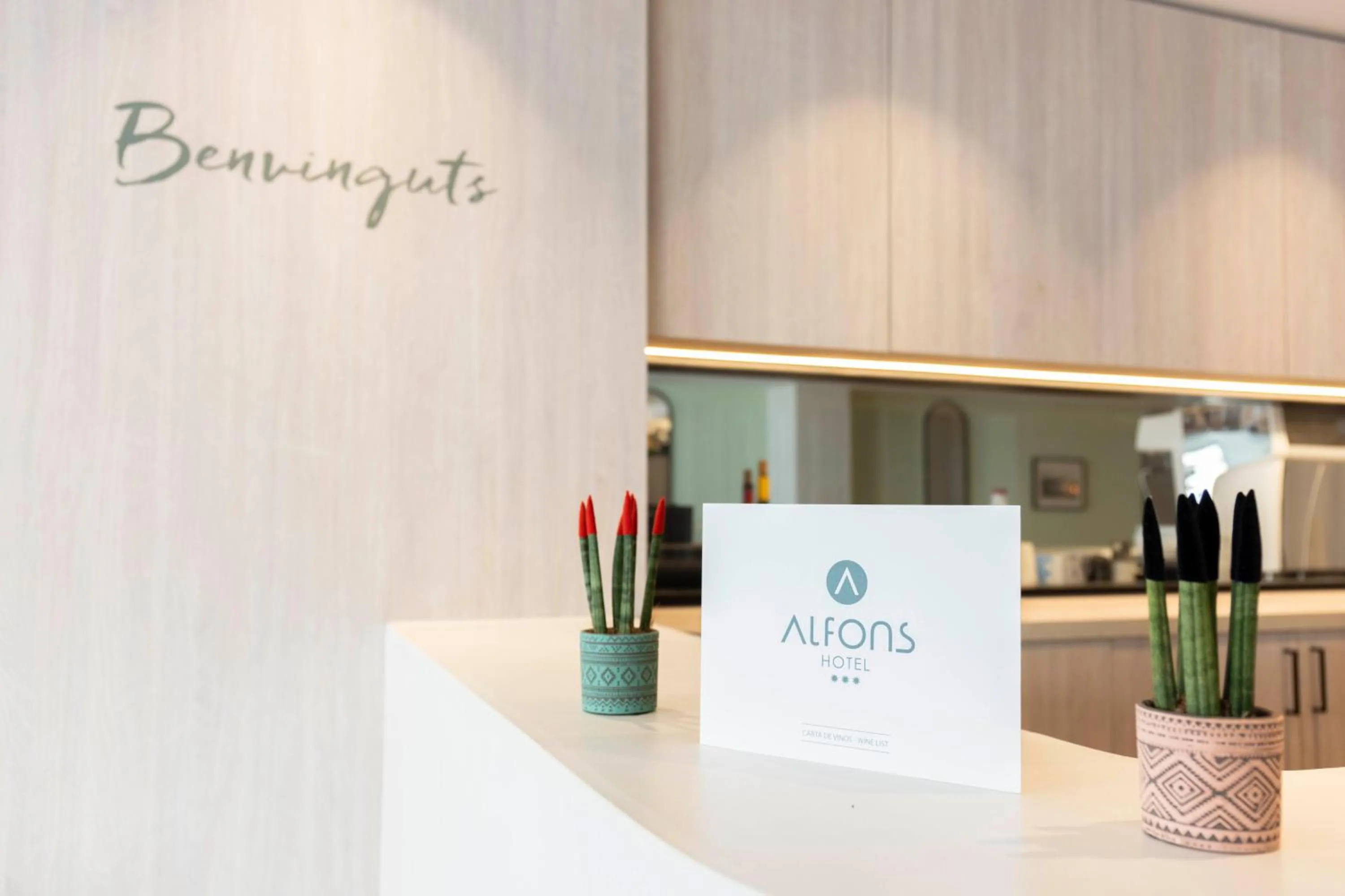 Lobby or reception in Alfons Hotel