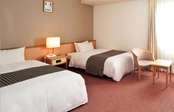Bed in Ishinomaki Grand Hotel