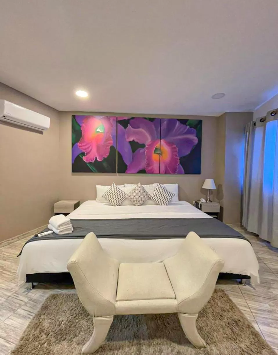 Bed in Bahia 79 Apartasuites Cerca al Centro