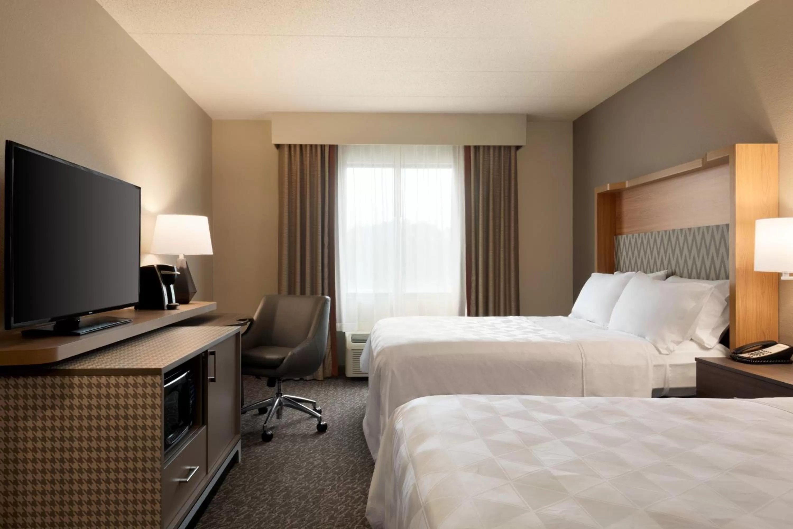 Photo of the whole room, Bed in Holiday Inn Hotel & Suites Council Bluffs by IHG