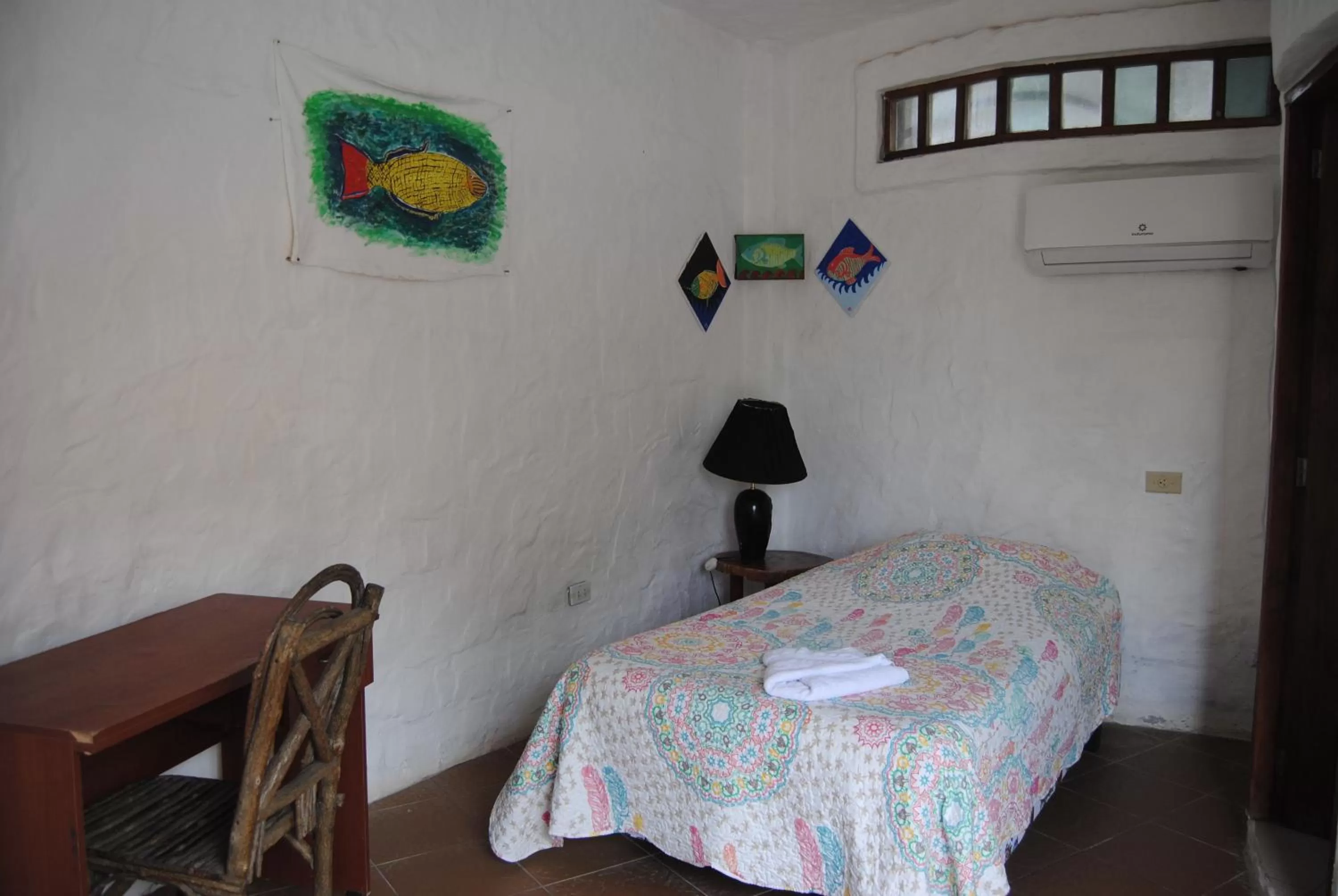 Photo of the whole room, Bed in Hostal Galapagos by Bar de Beto