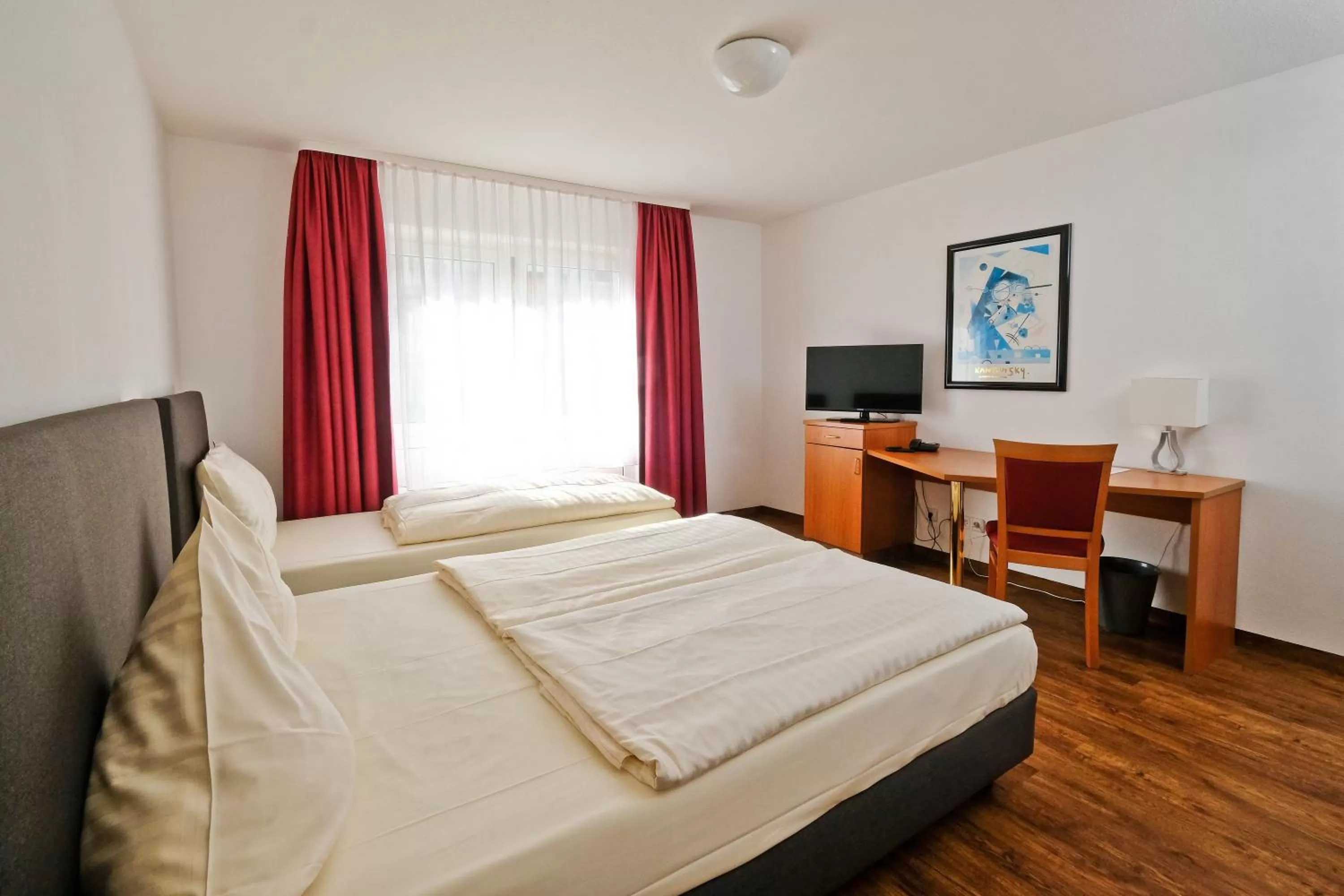 Bed in Apart Hotel Sehnde