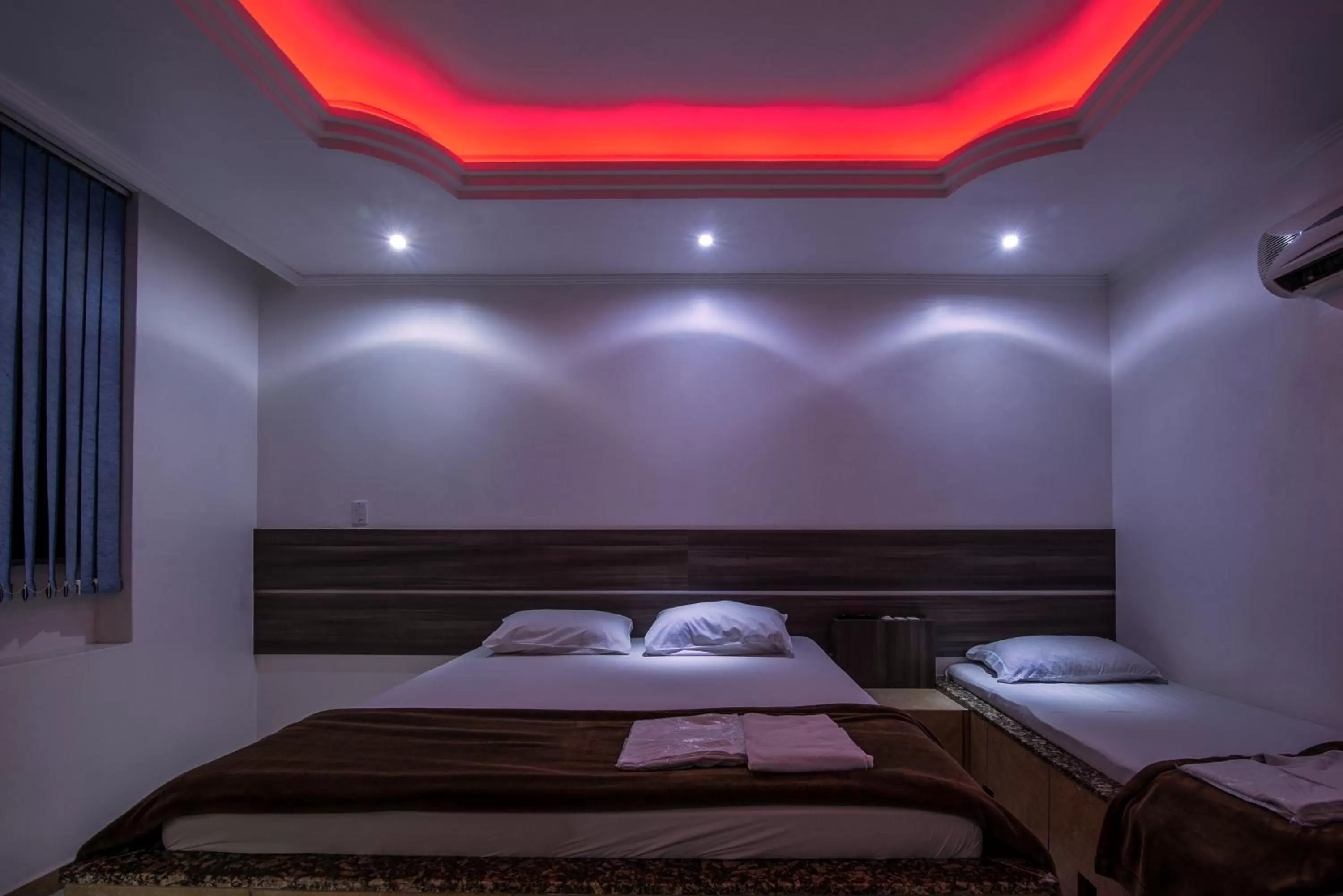 Bedroom in Classic Hotel e Motel