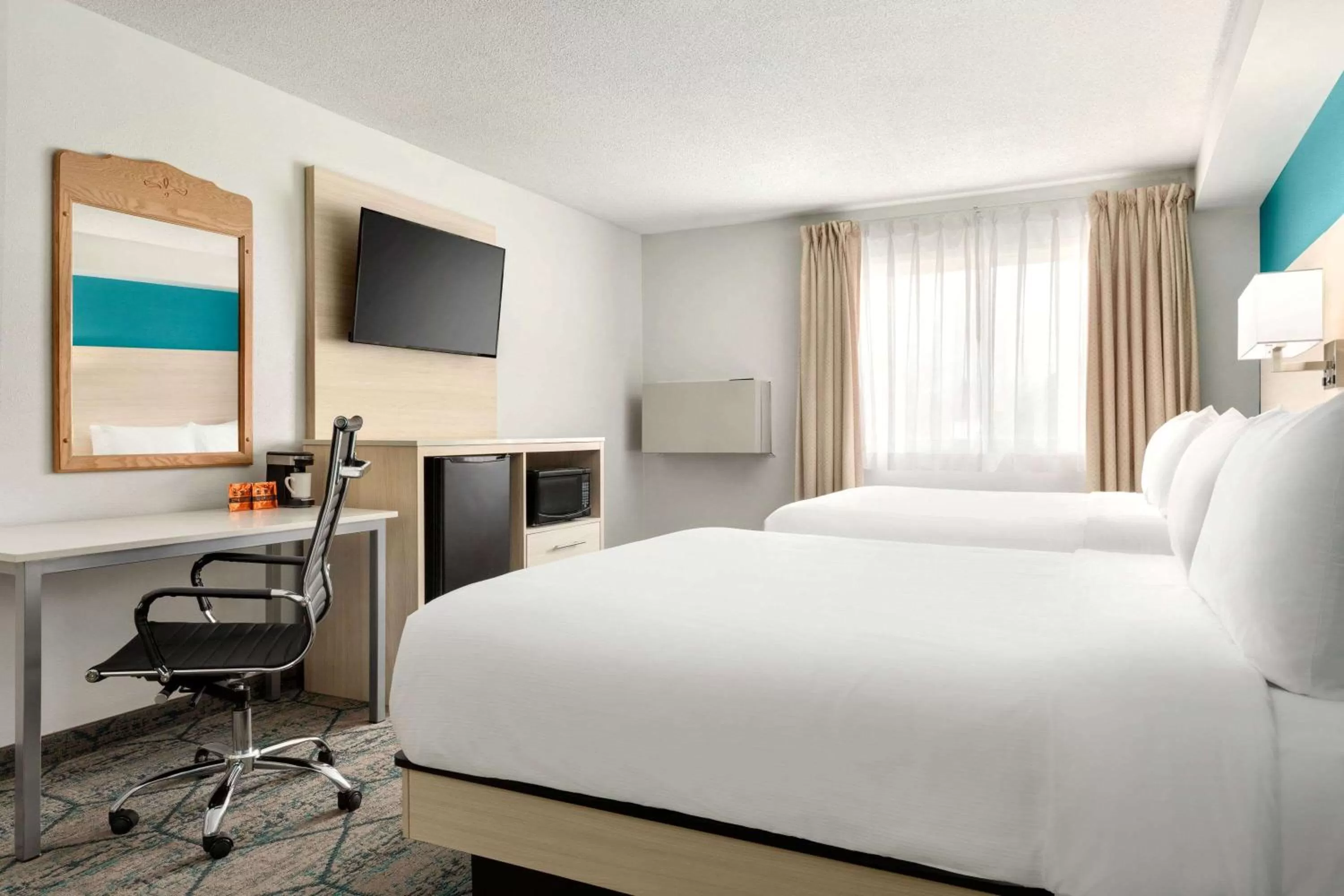Bedroom, Bed in Ramada by Wyndham Miramichi New Brunswick