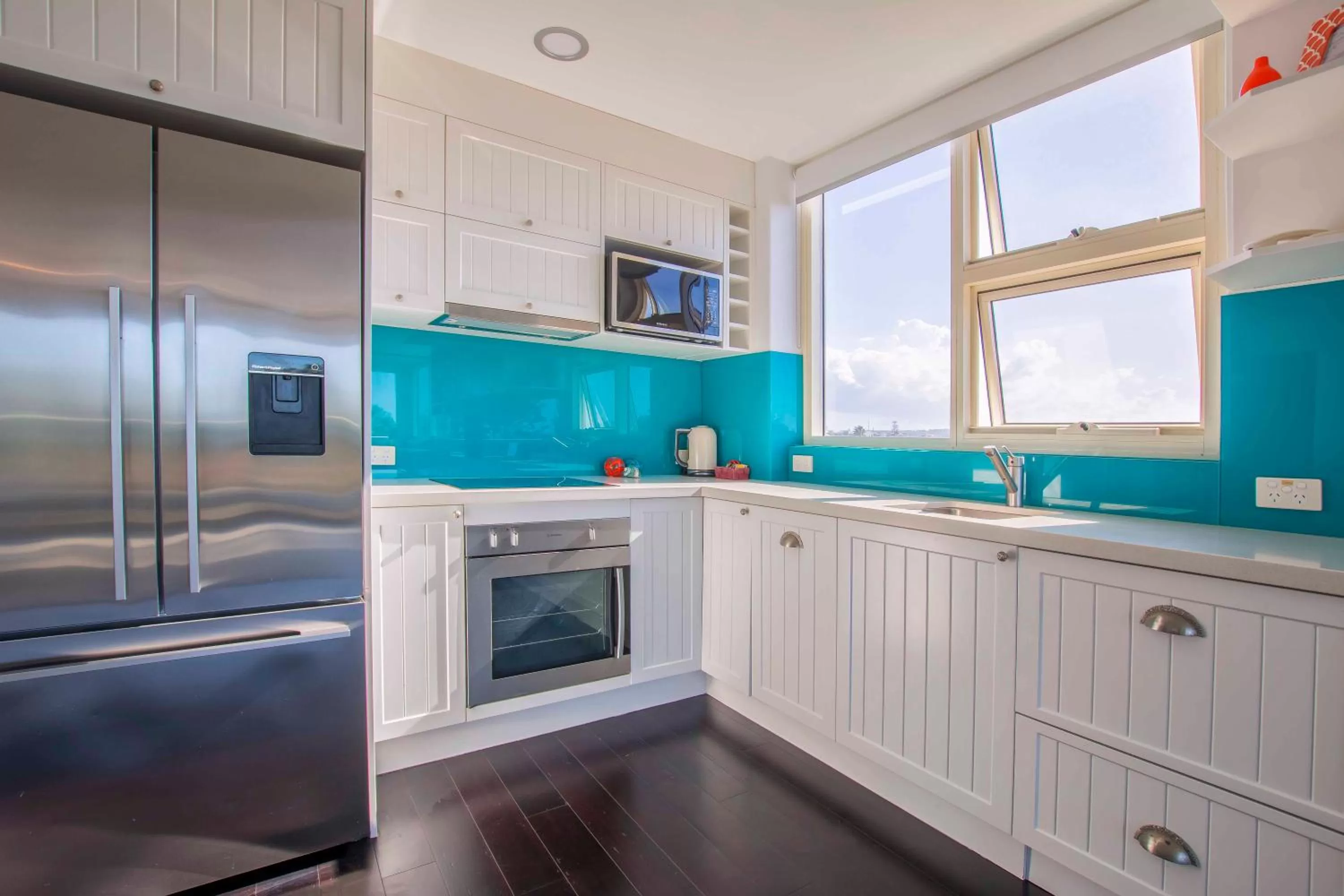 Kitchen or kitchenette in 84 The Spit Holiday Apartments