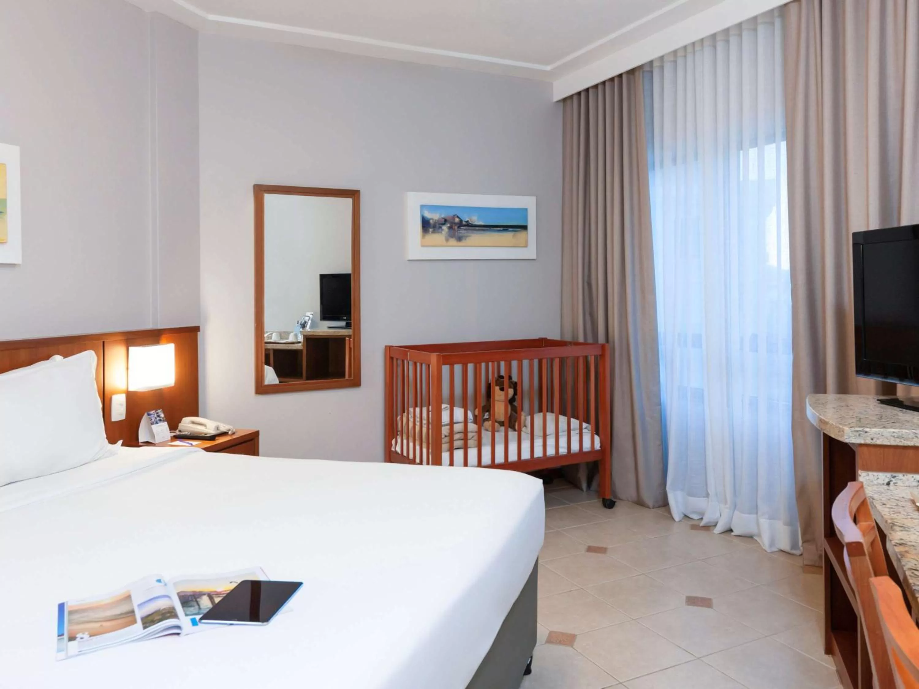 Photo of the whole room, Bed in Mercure Florianópolis