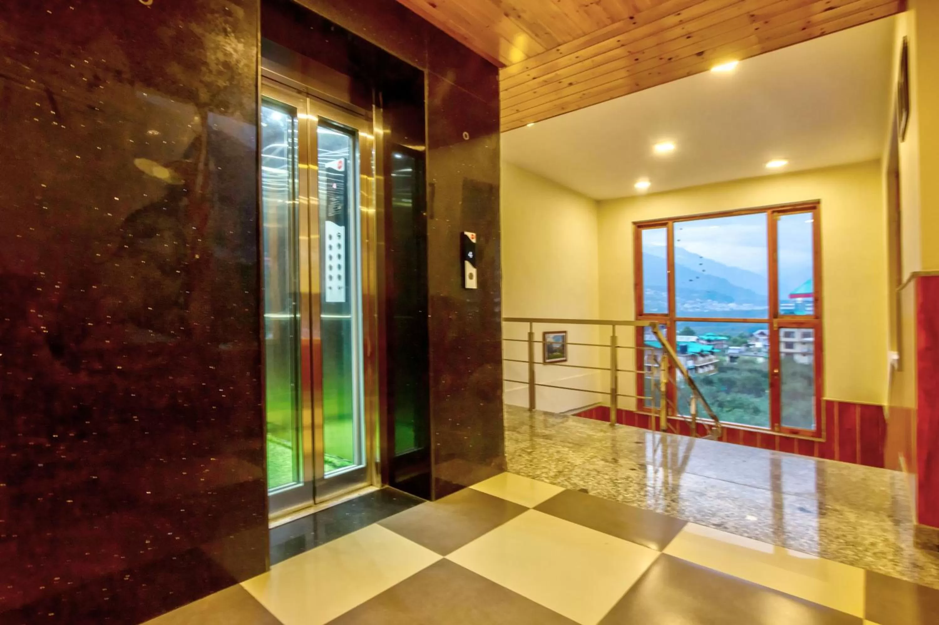 elevator in Snow City's Montana Blues Resort Manali - Heated & Air-Cooled Stay