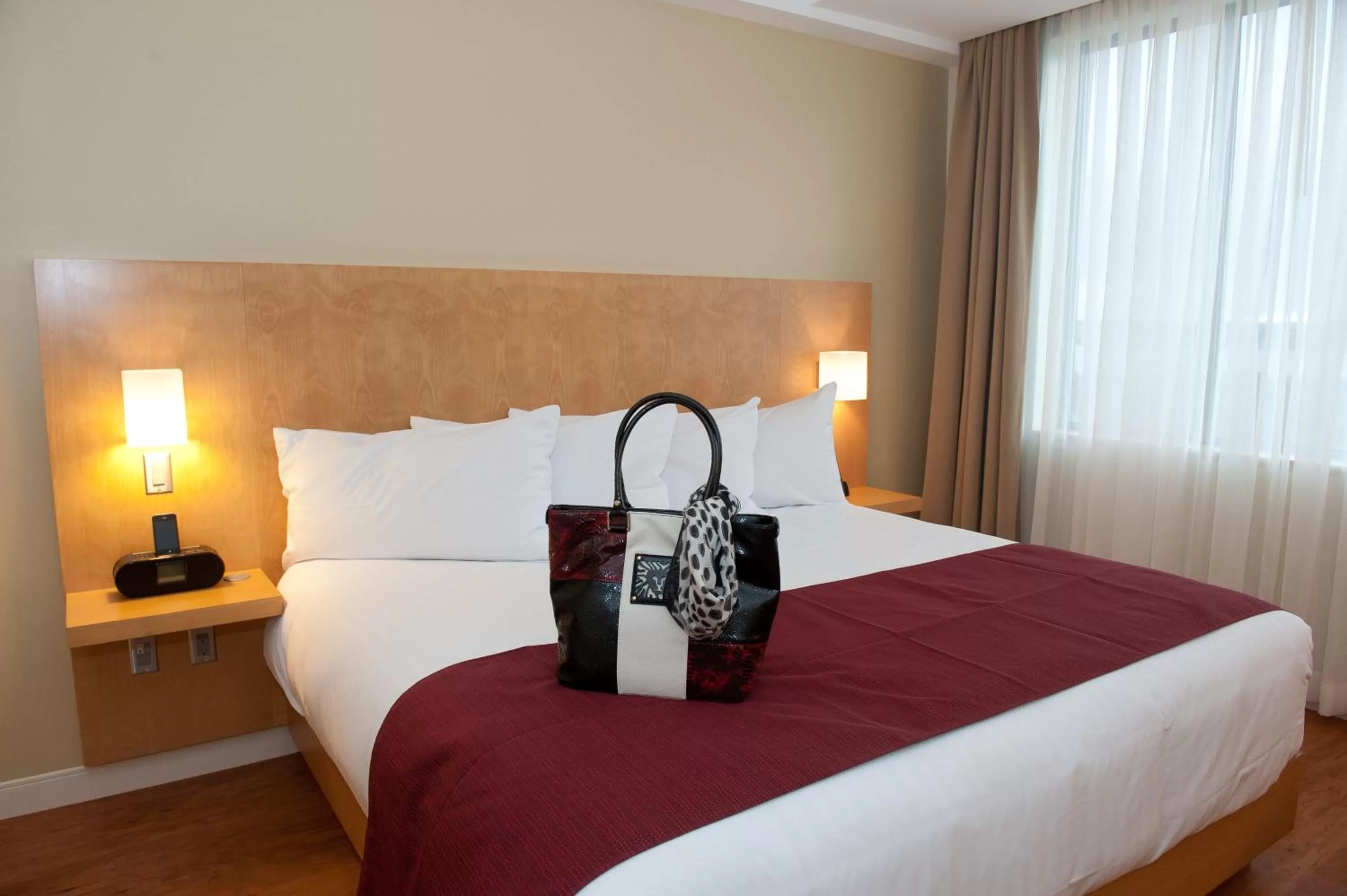 Bed in The Holman Grand Hotel