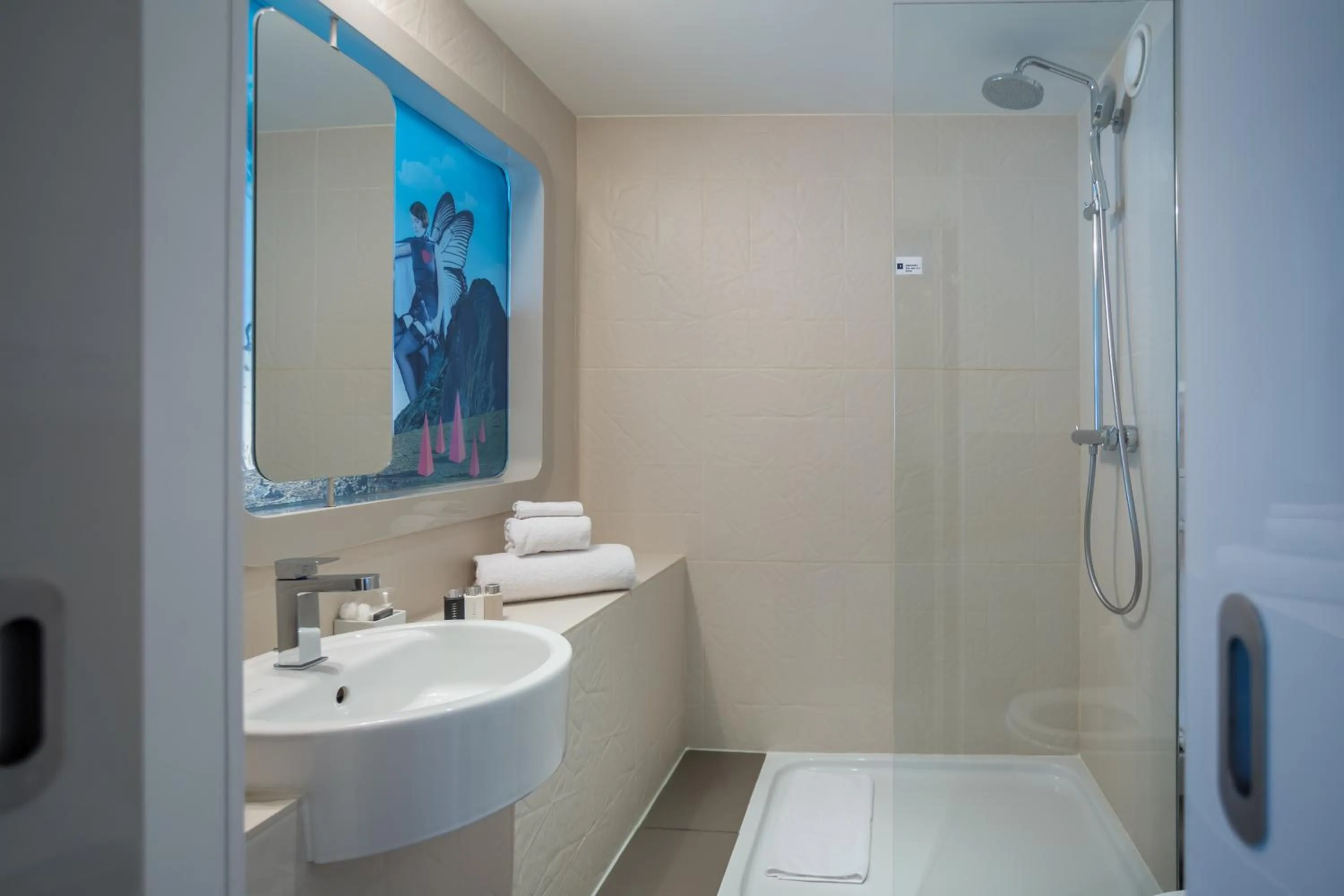 Shower, Bathroom in Hôtel Le Marcel Paris Gare de l'Est