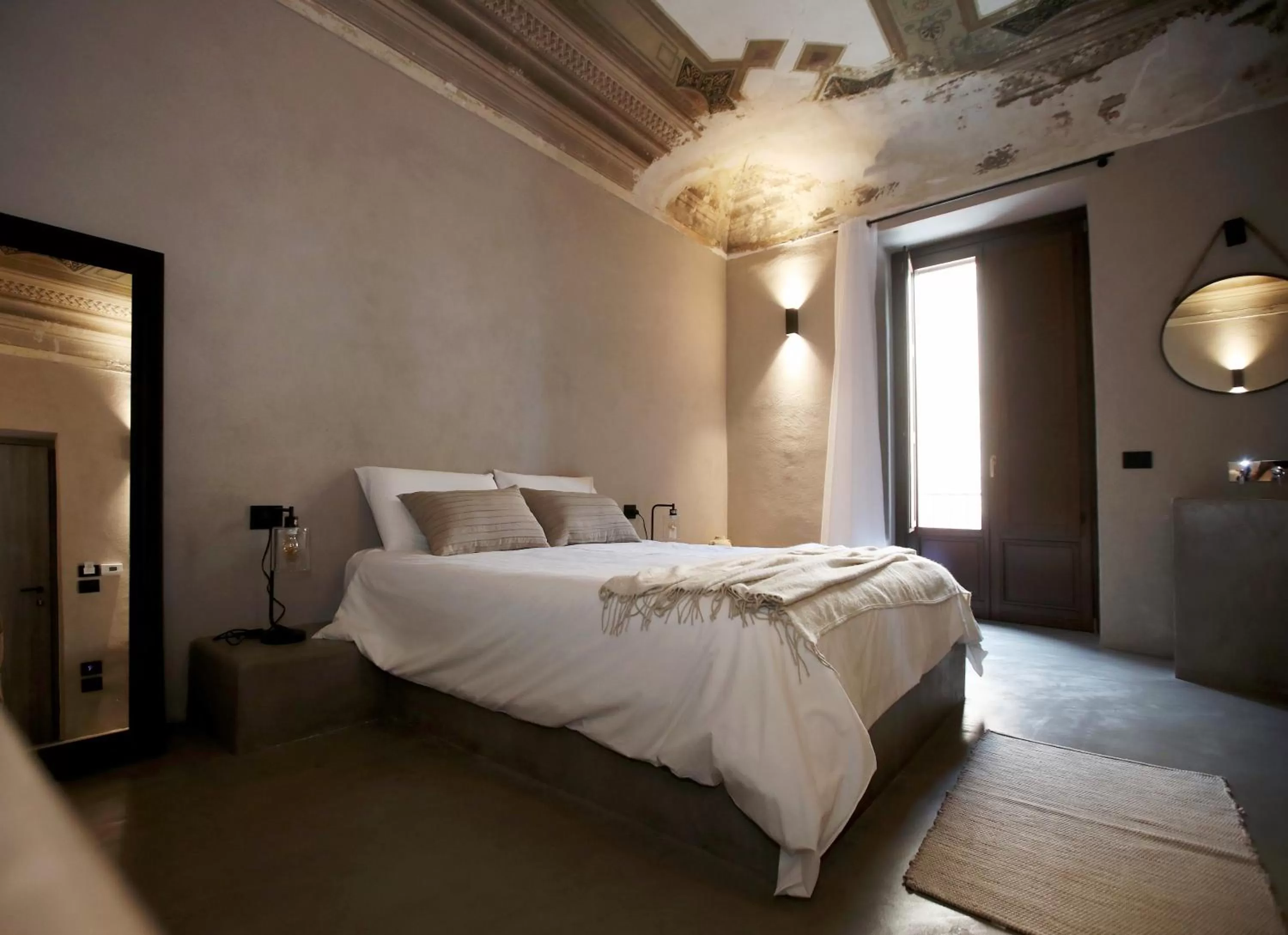 Bed in Casa Nostra Luxury Suites & Spa