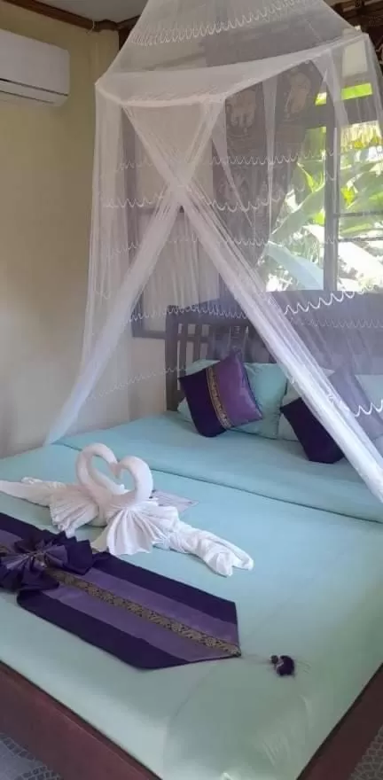 Photo of the whole room, Bed in Khao Sok River & Jungle Resort