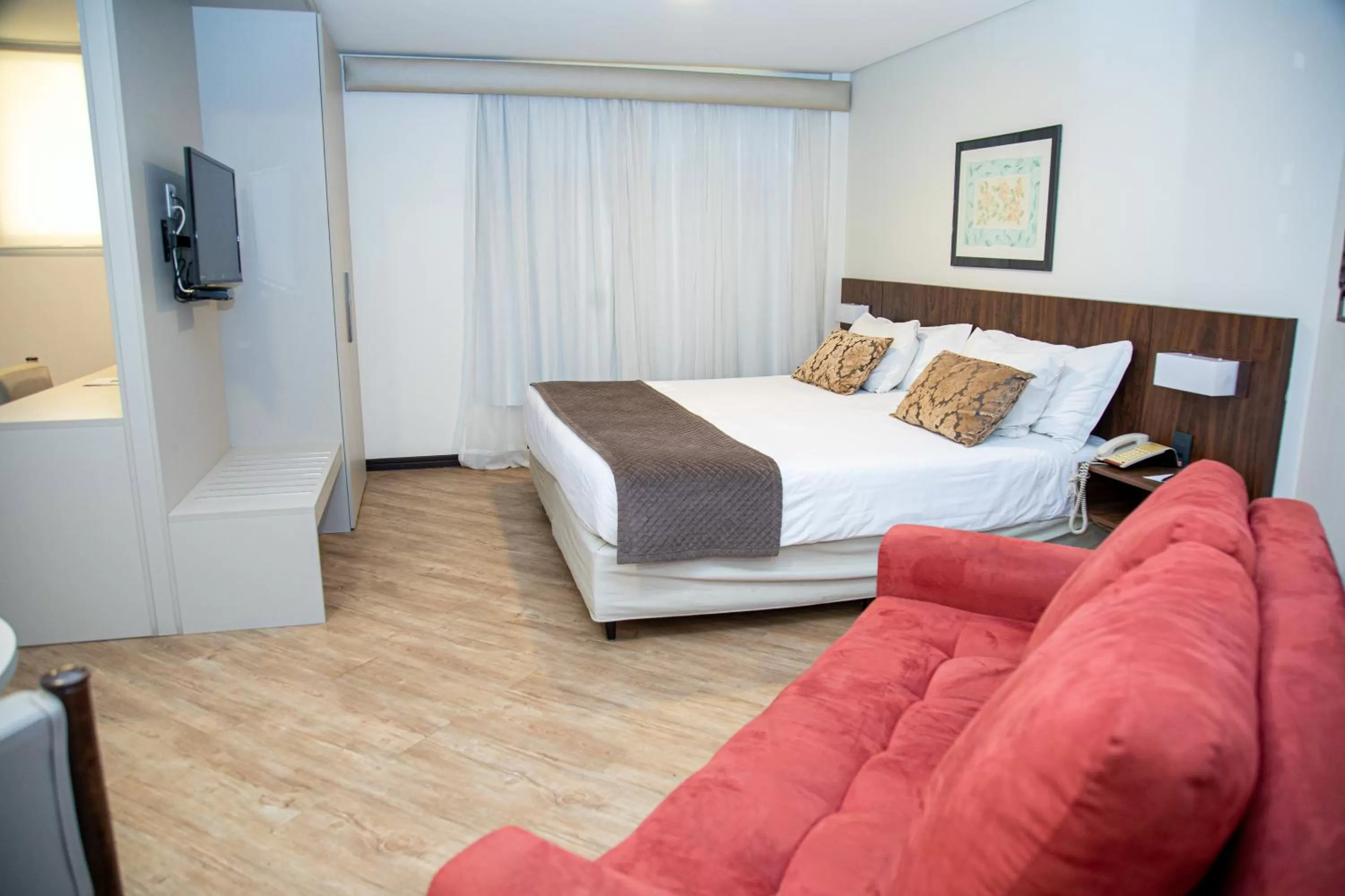 Bed in Plaza Blumenau Hotel