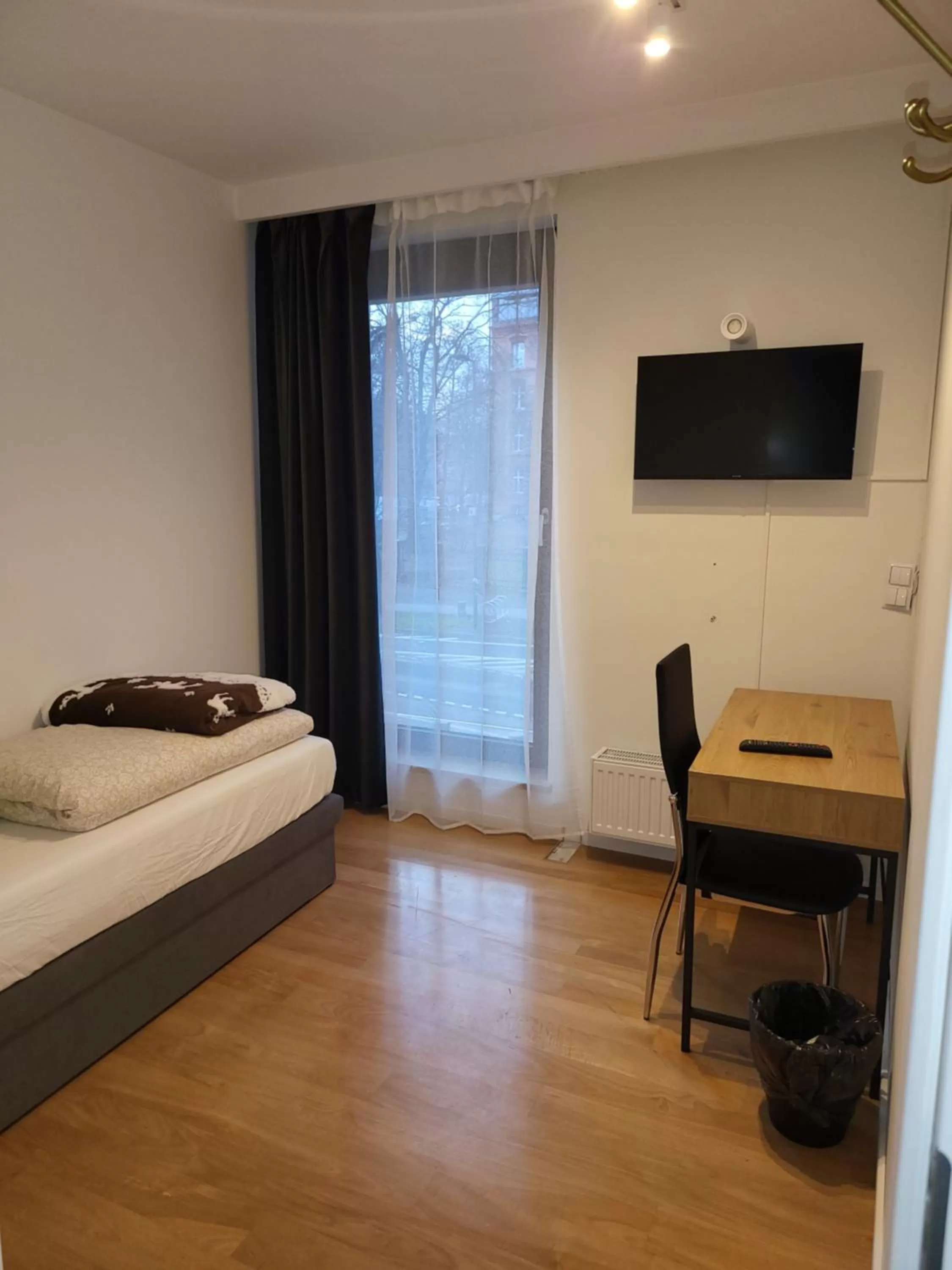 Photo of the whole room, TV/Entertainment Center in Amber Hostel Szlak