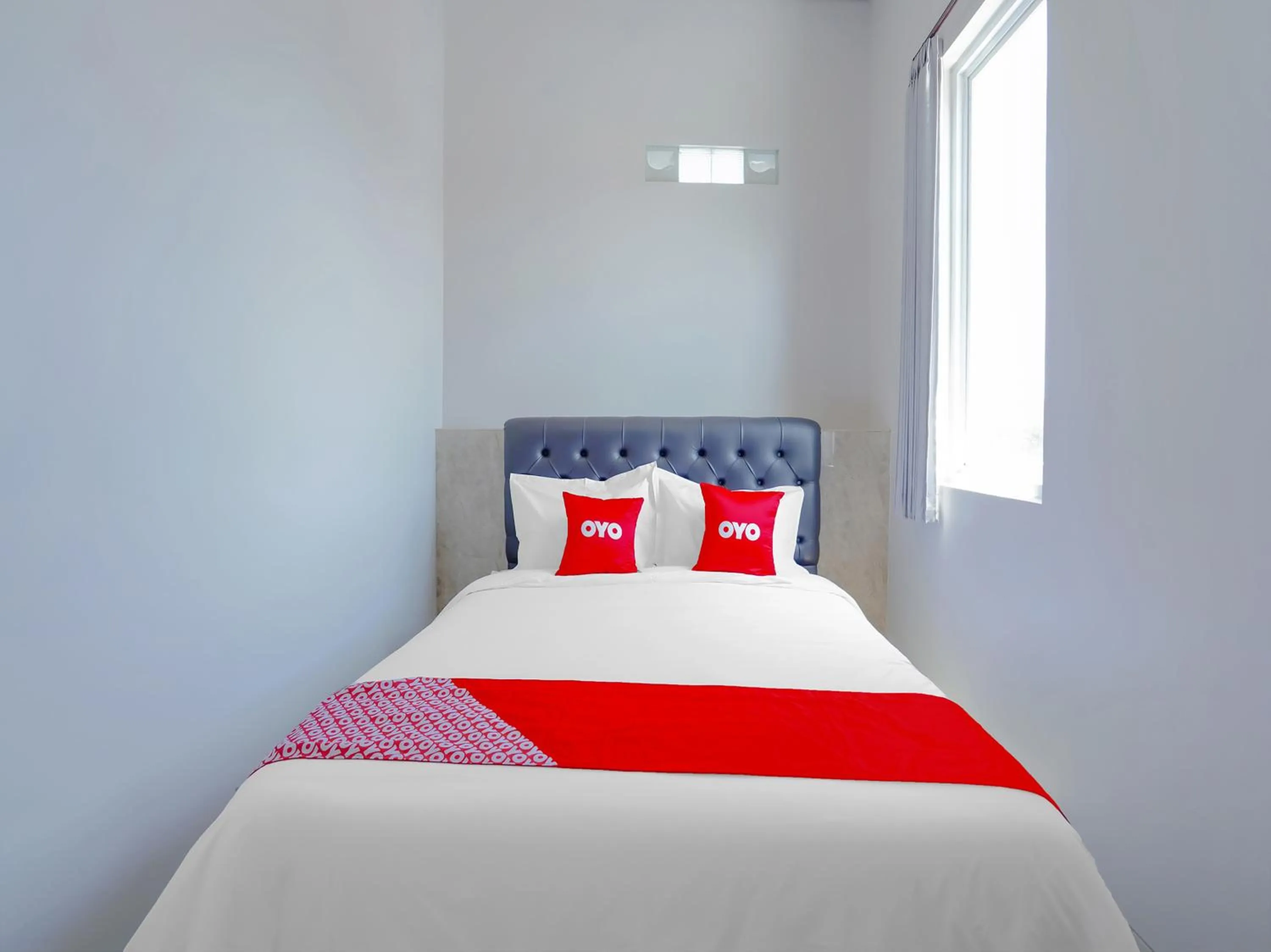 Bedroom in Capital O 90336 Olive Guest House