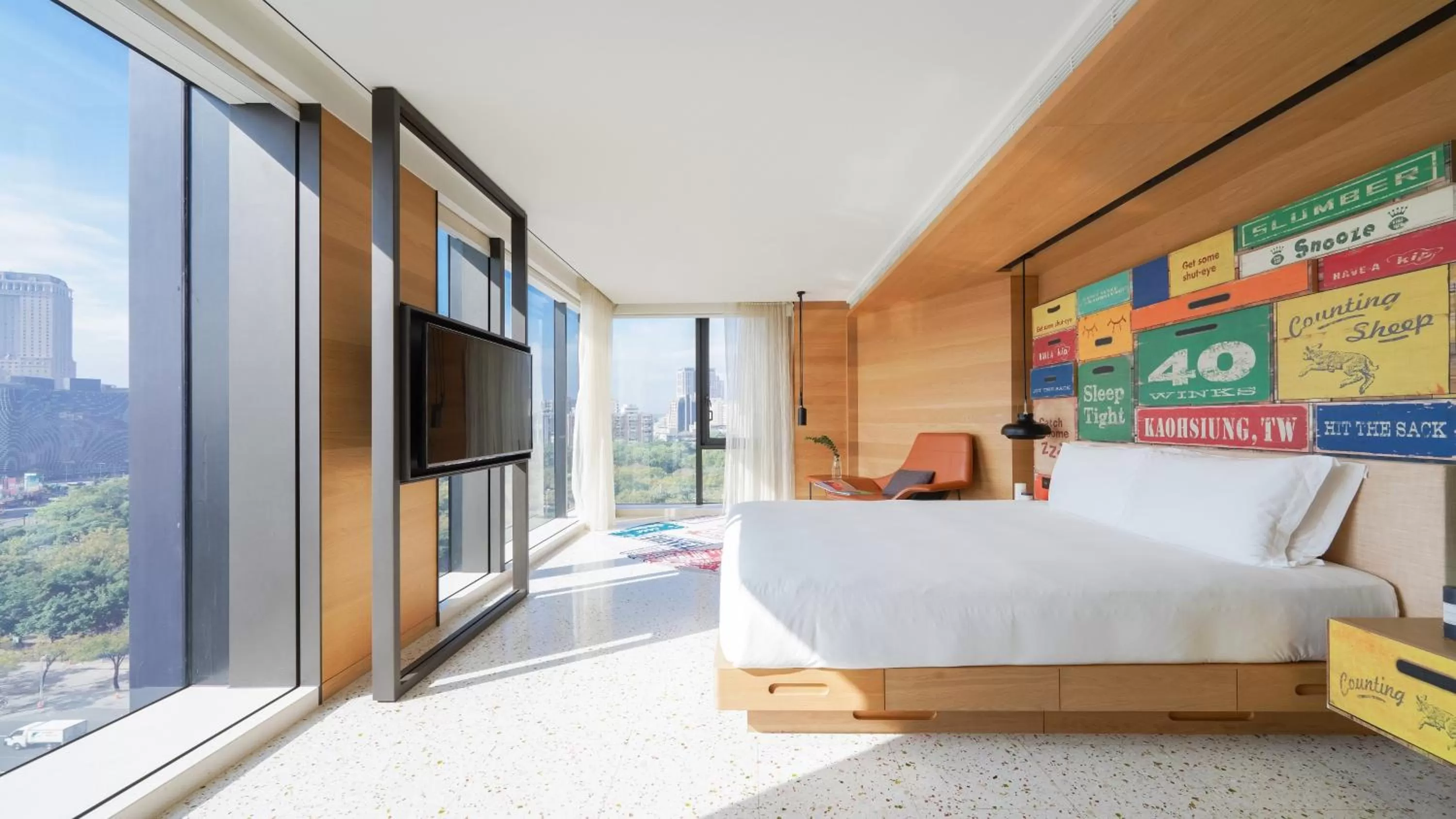 Photo of the whole room, Bed in Hotel Indigo Kaohsiung Central Park by IHG