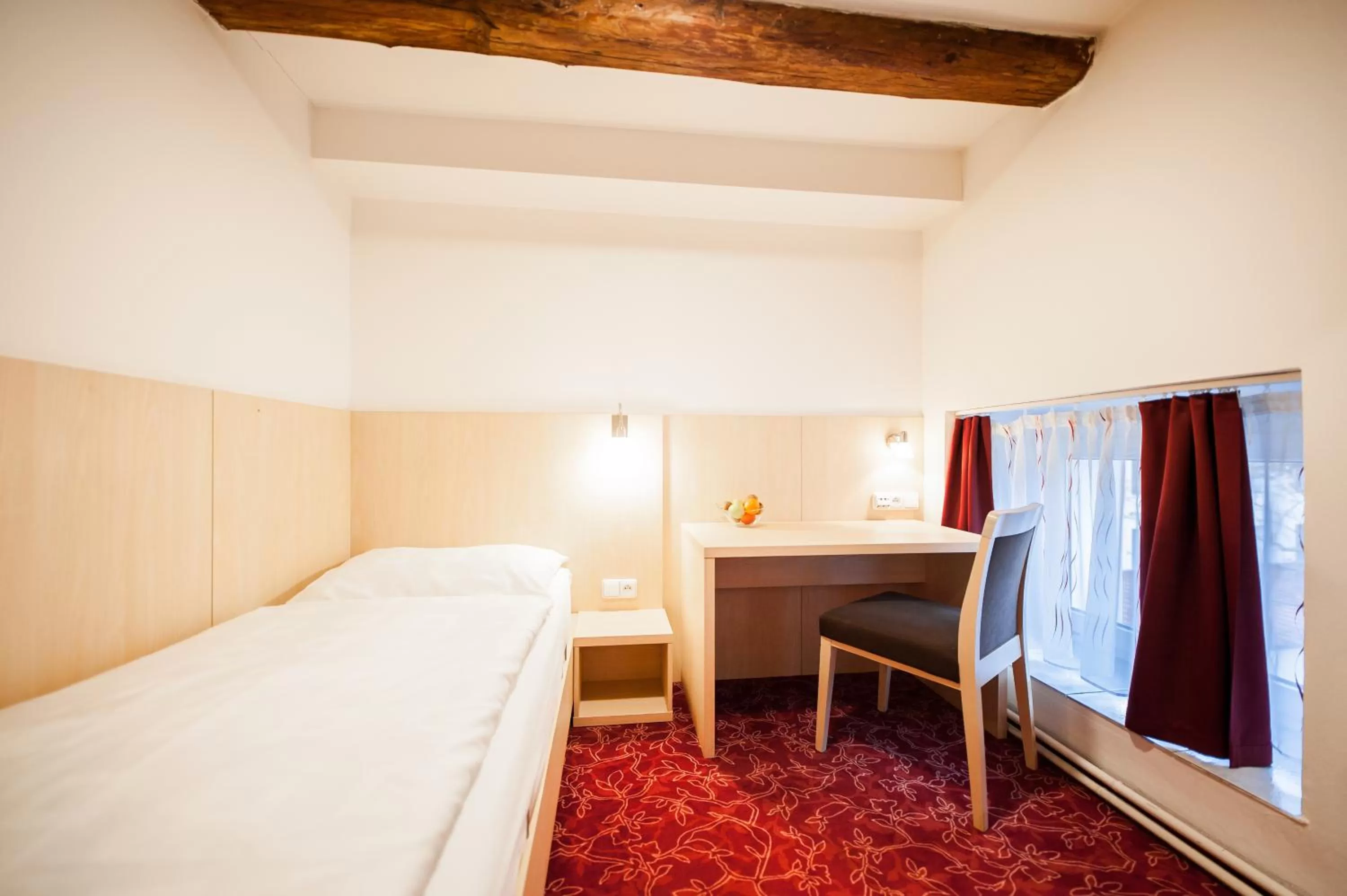 Bed in Hotel Pivovar