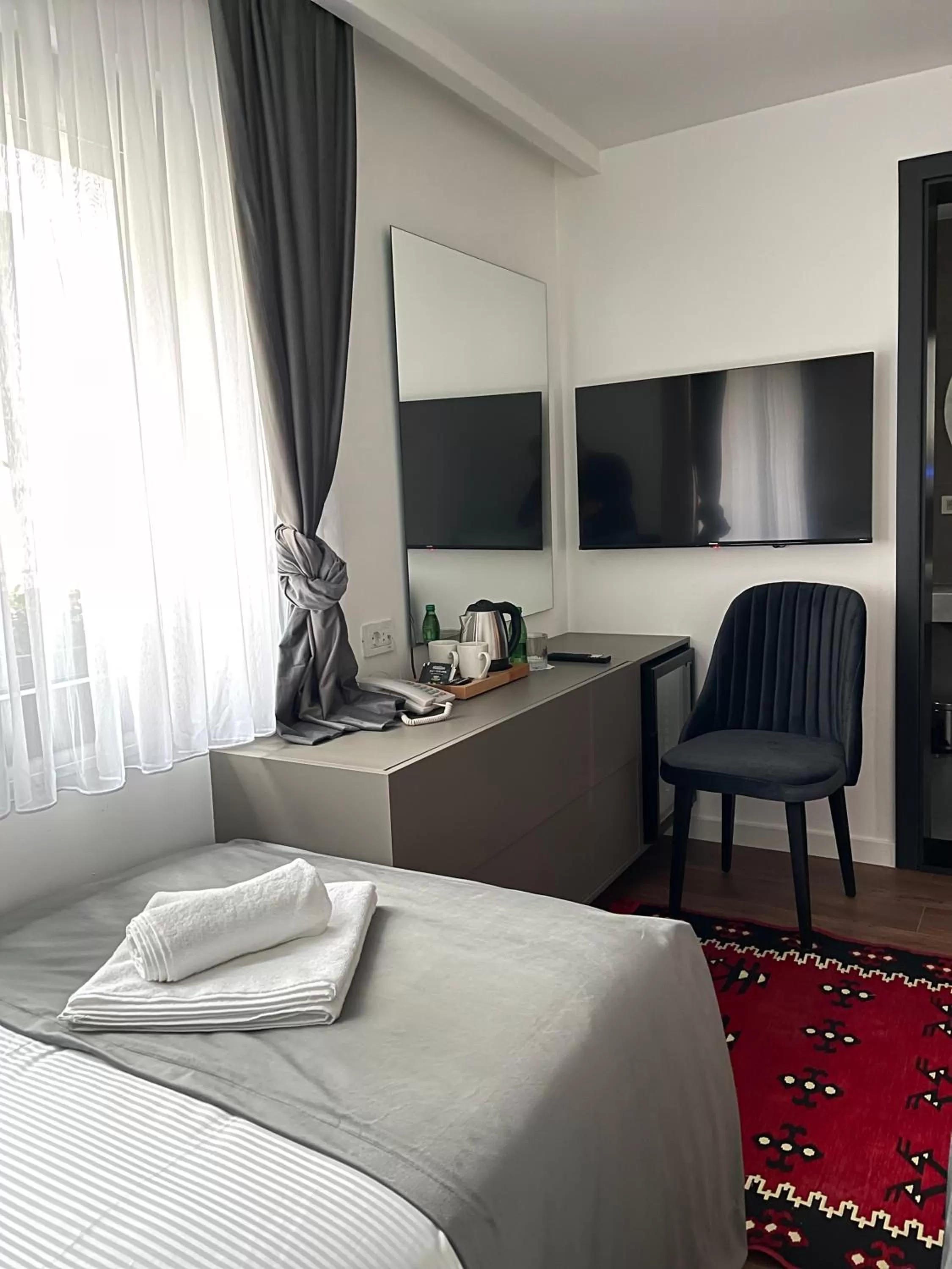 TV/Entertainment Center in Etnomania Boutique Hotel