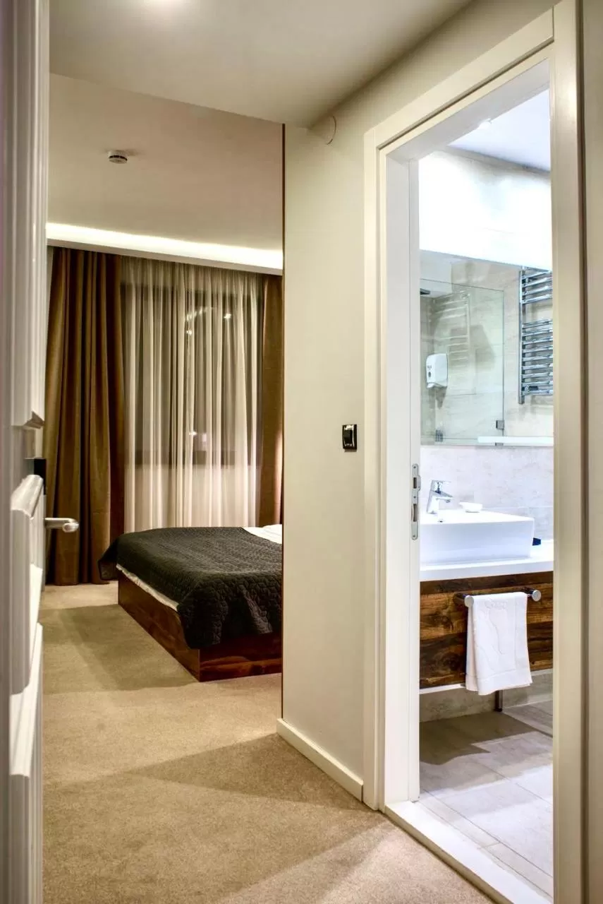 Photo of the whole room, Bed in IG Hotel