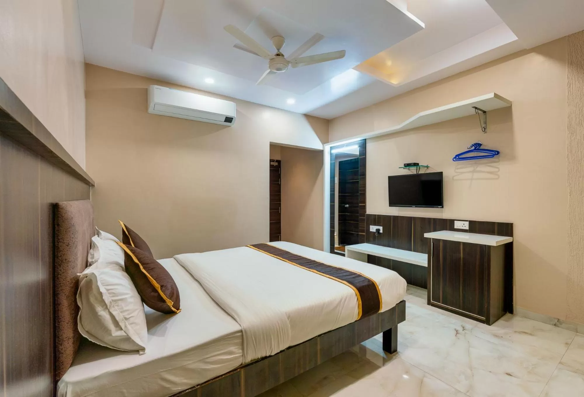 View (from property/room), Bed in Hotel Aatithya Satkar Near Mahalaxmi Temple