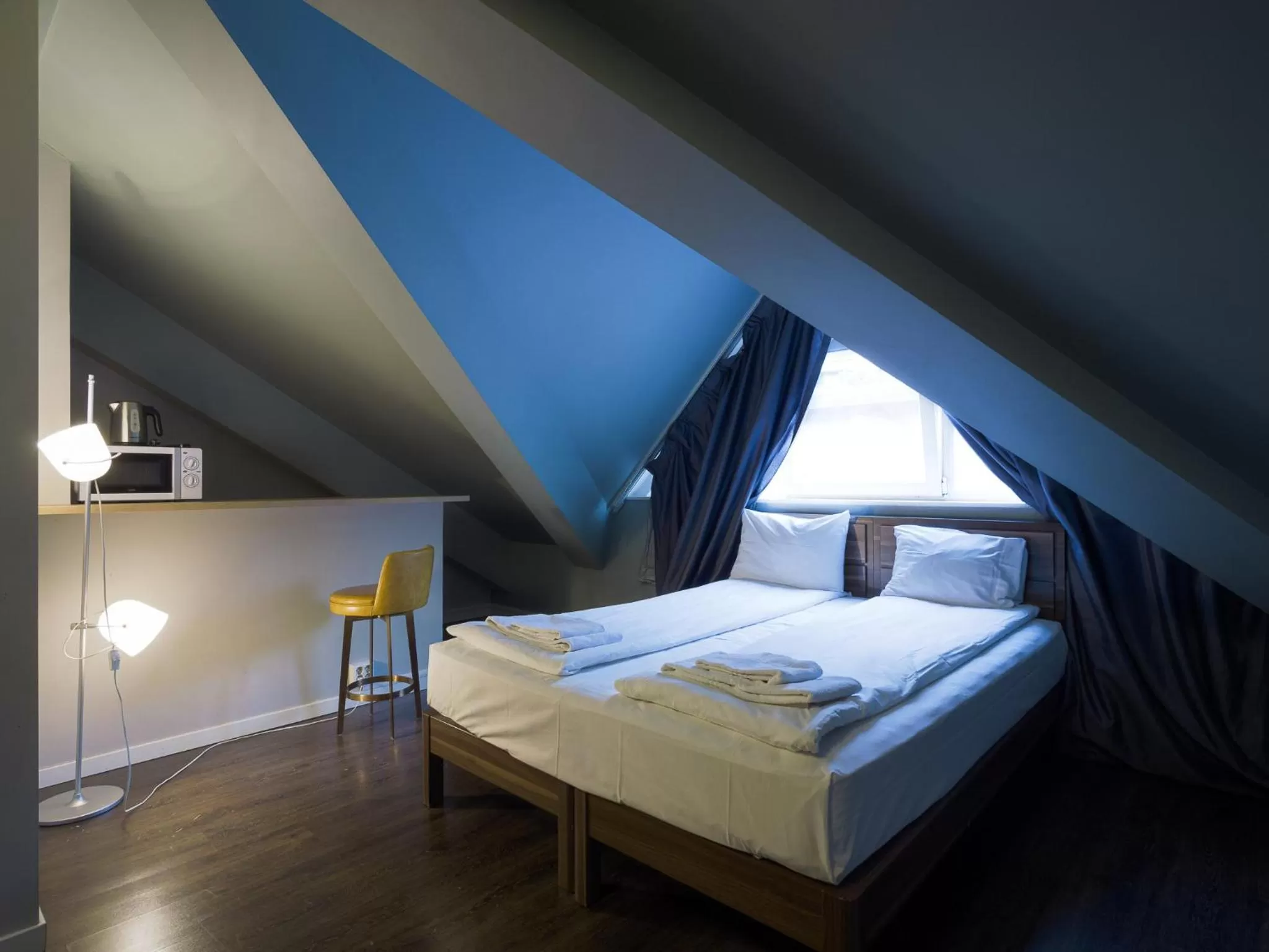 Bed in Central City Apartments