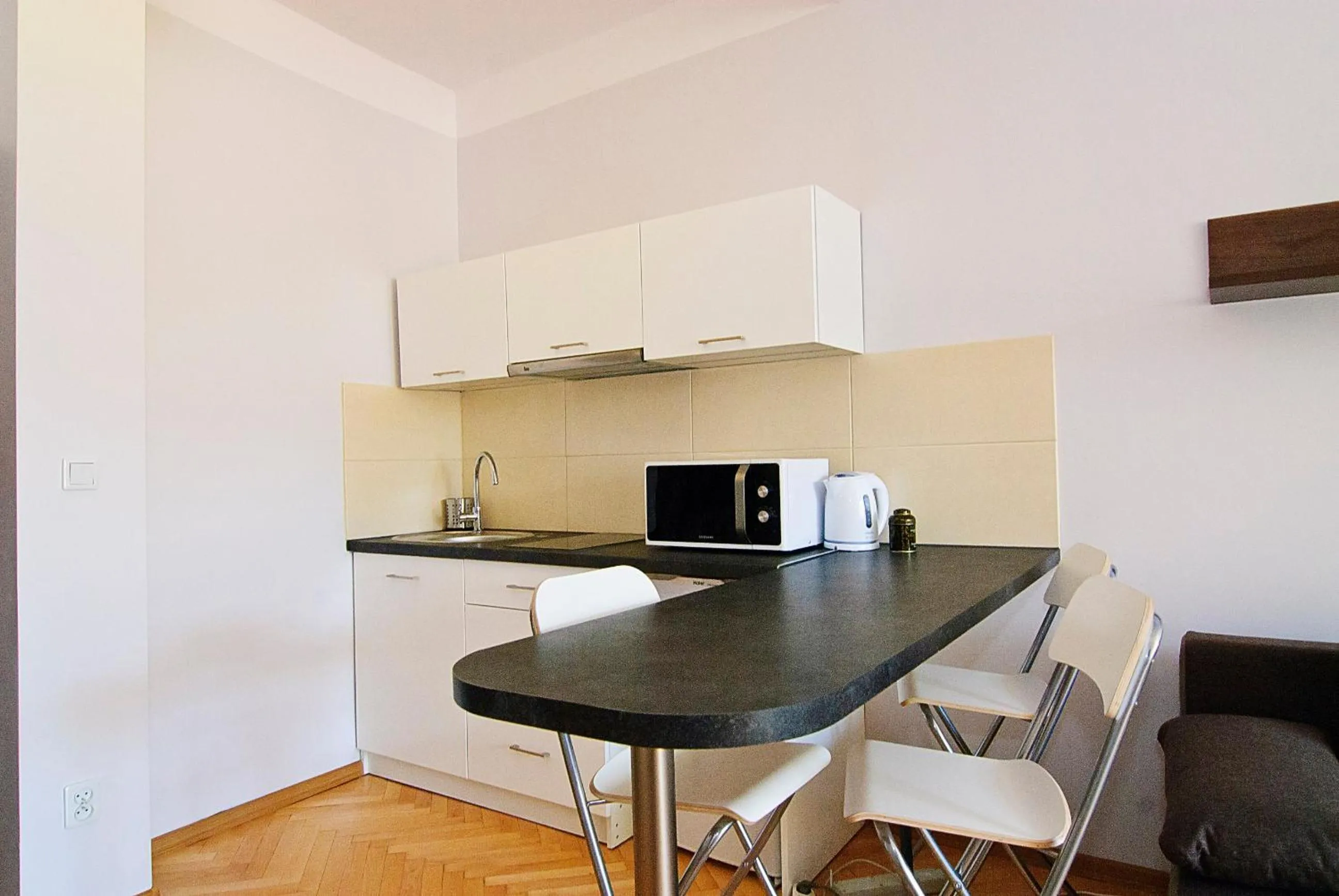 Kitchen or kitchenette in P&J Apartments Floriańska