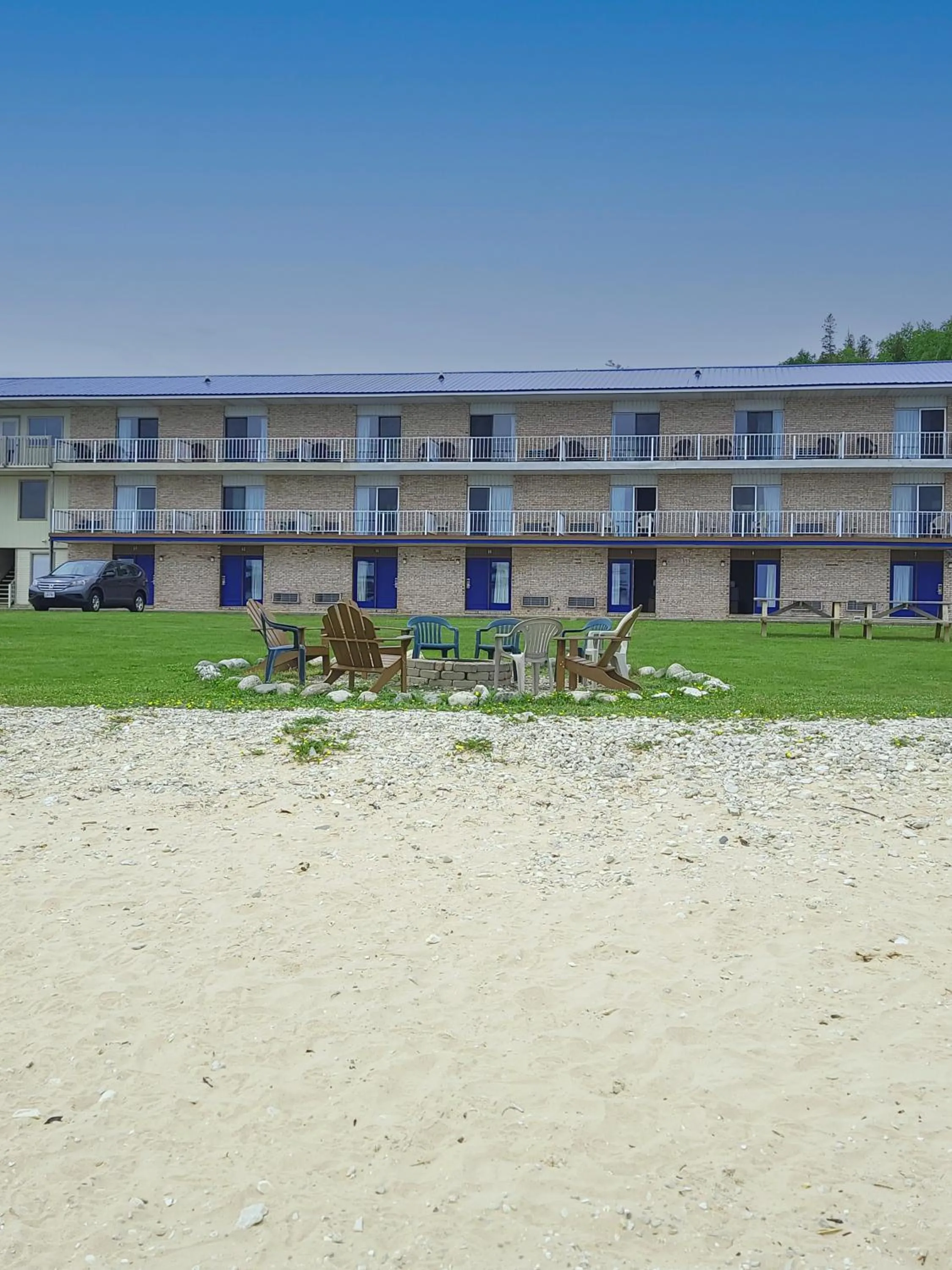 Property building in Days Inn & Suites by Wyndham St. Ignace Lakefront