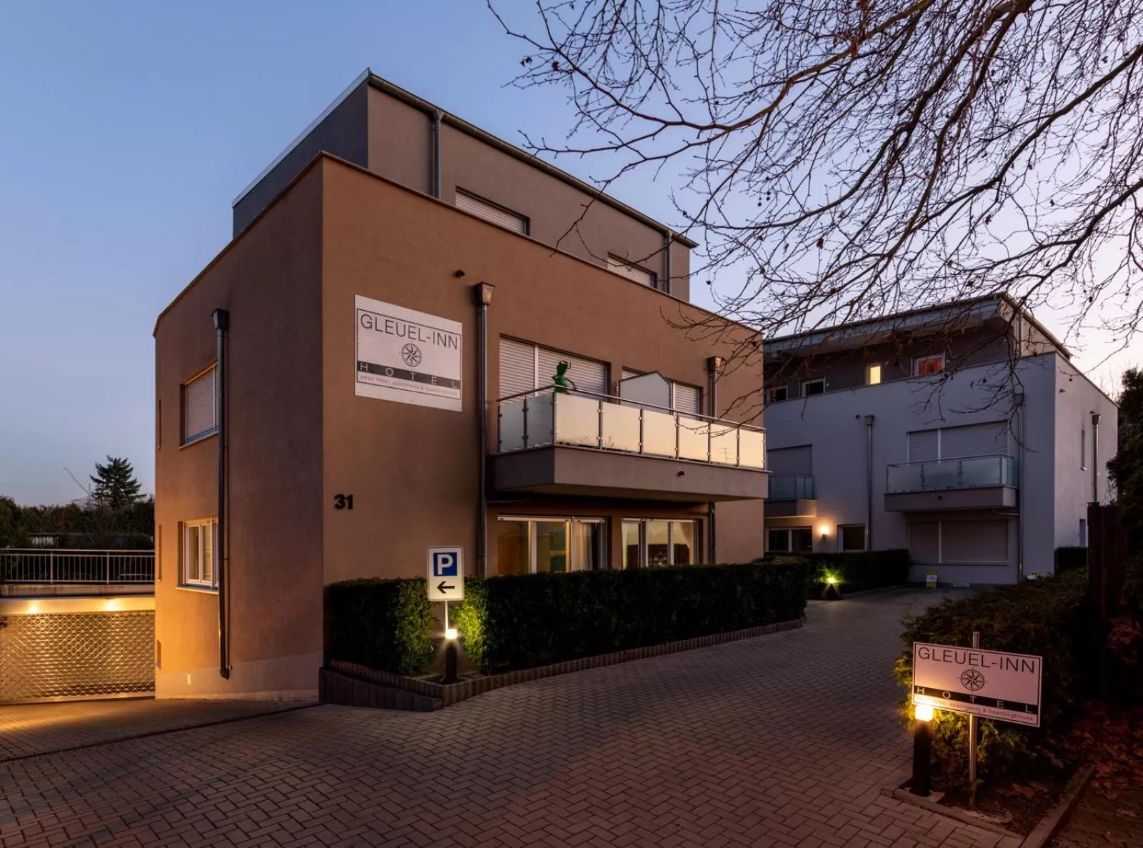 Property Building in GLEUEL INN - digital hotel & serviced apartments & boardinghouse mit voll ausgestatteten Küchen