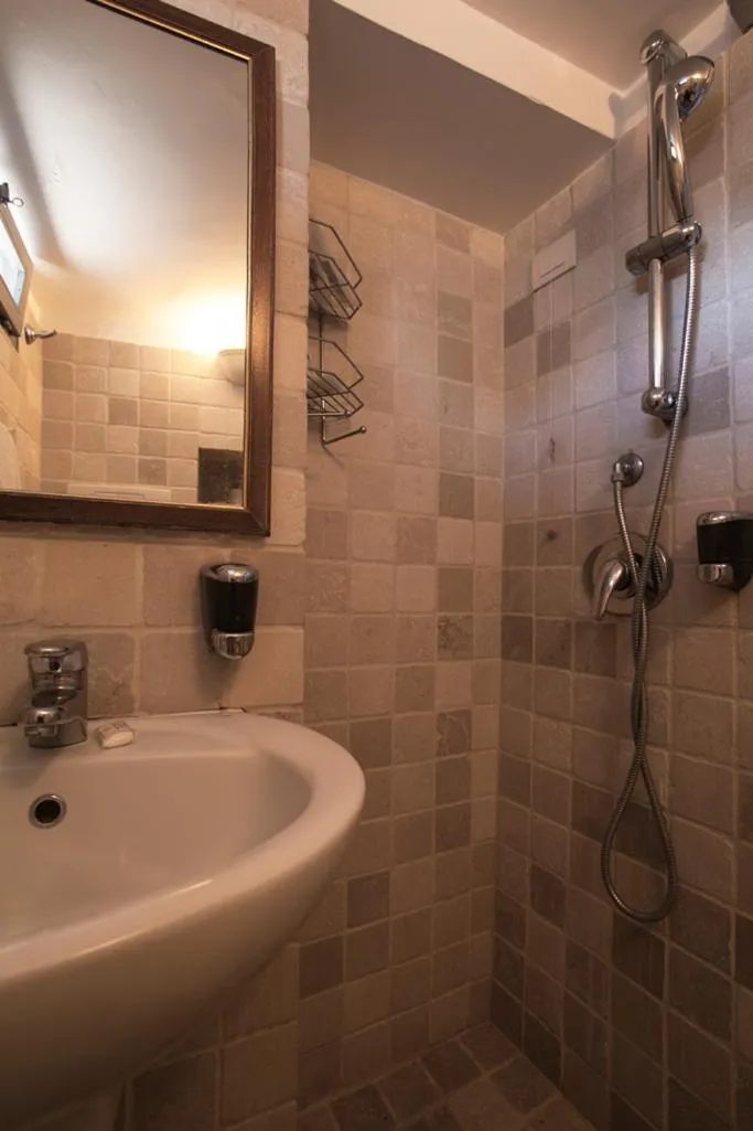 Bathroom in Grand Hotel la Chiusa di Chietri