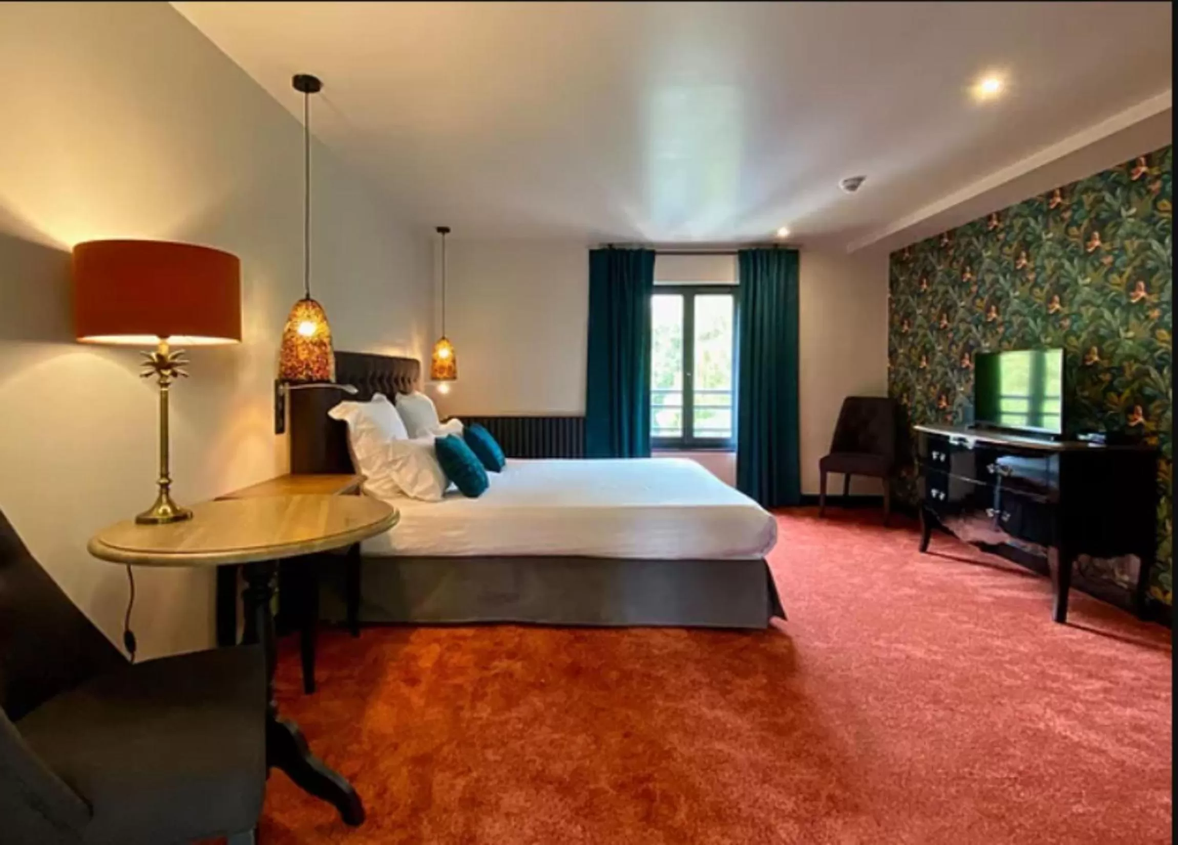 Photo of the whole room, Bed in Le Moulin Fouret