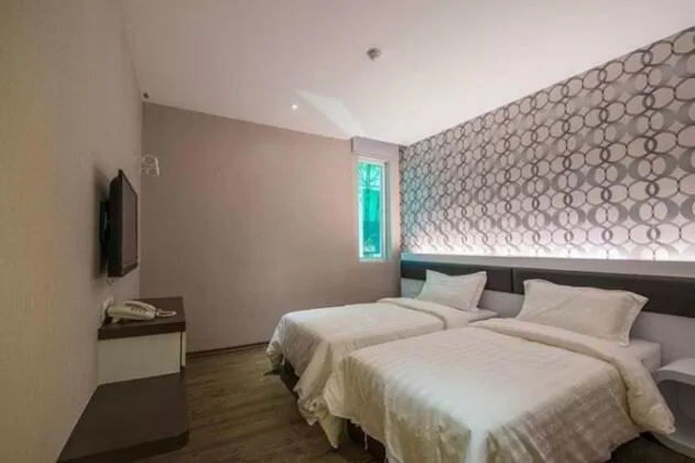 Bed in Riverfront Boutique Hotel