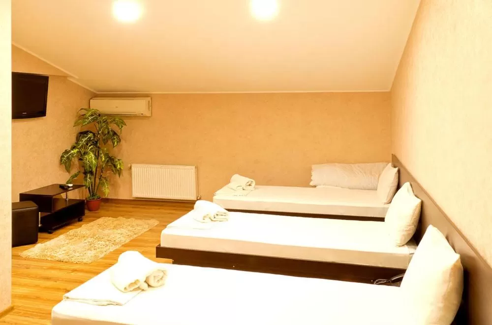 Bed, Room Photo in Hotel 8th Mile