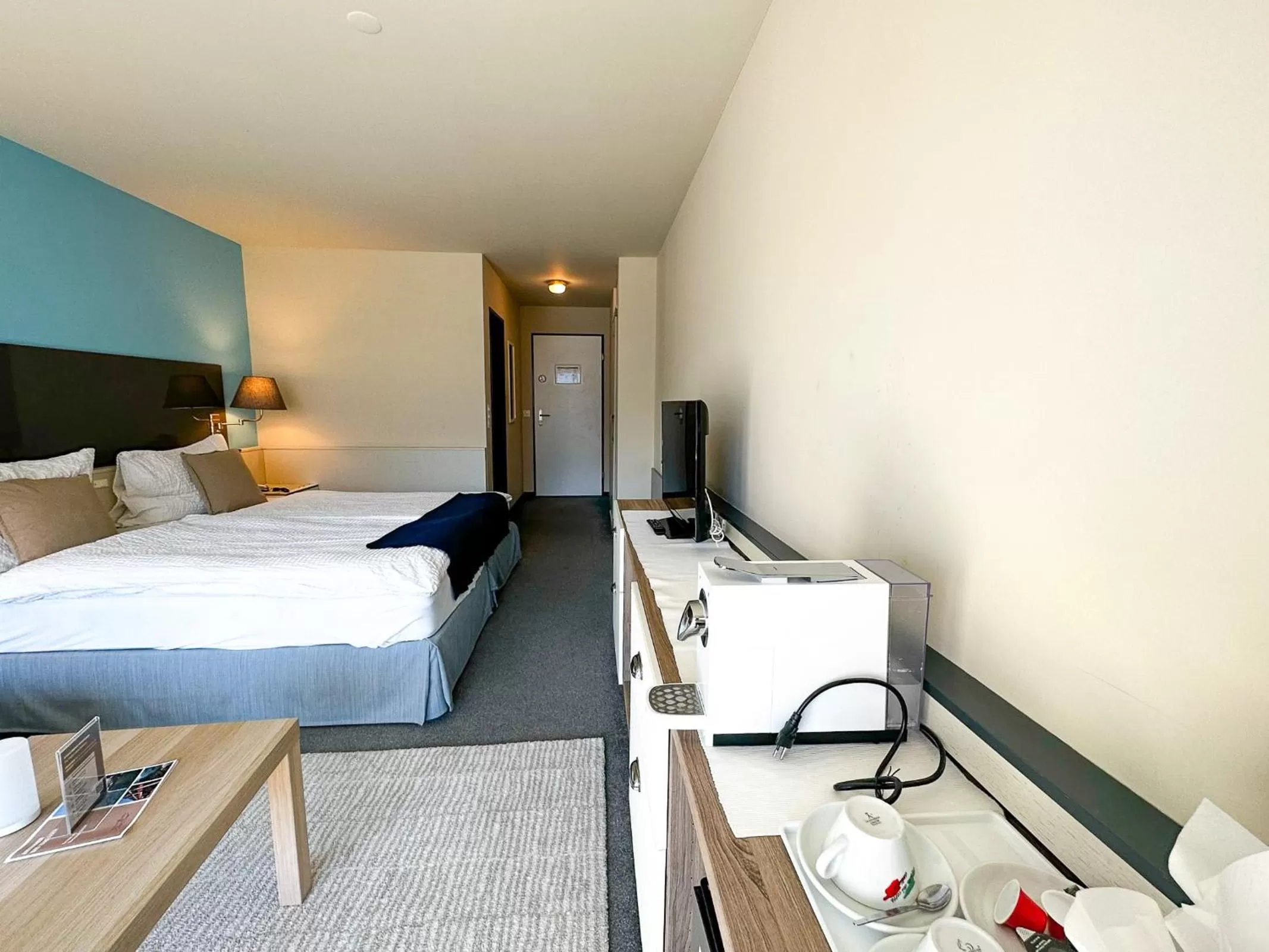 Photo of the whole room, Bed in Seehotel Riviera at Lake Lucerne