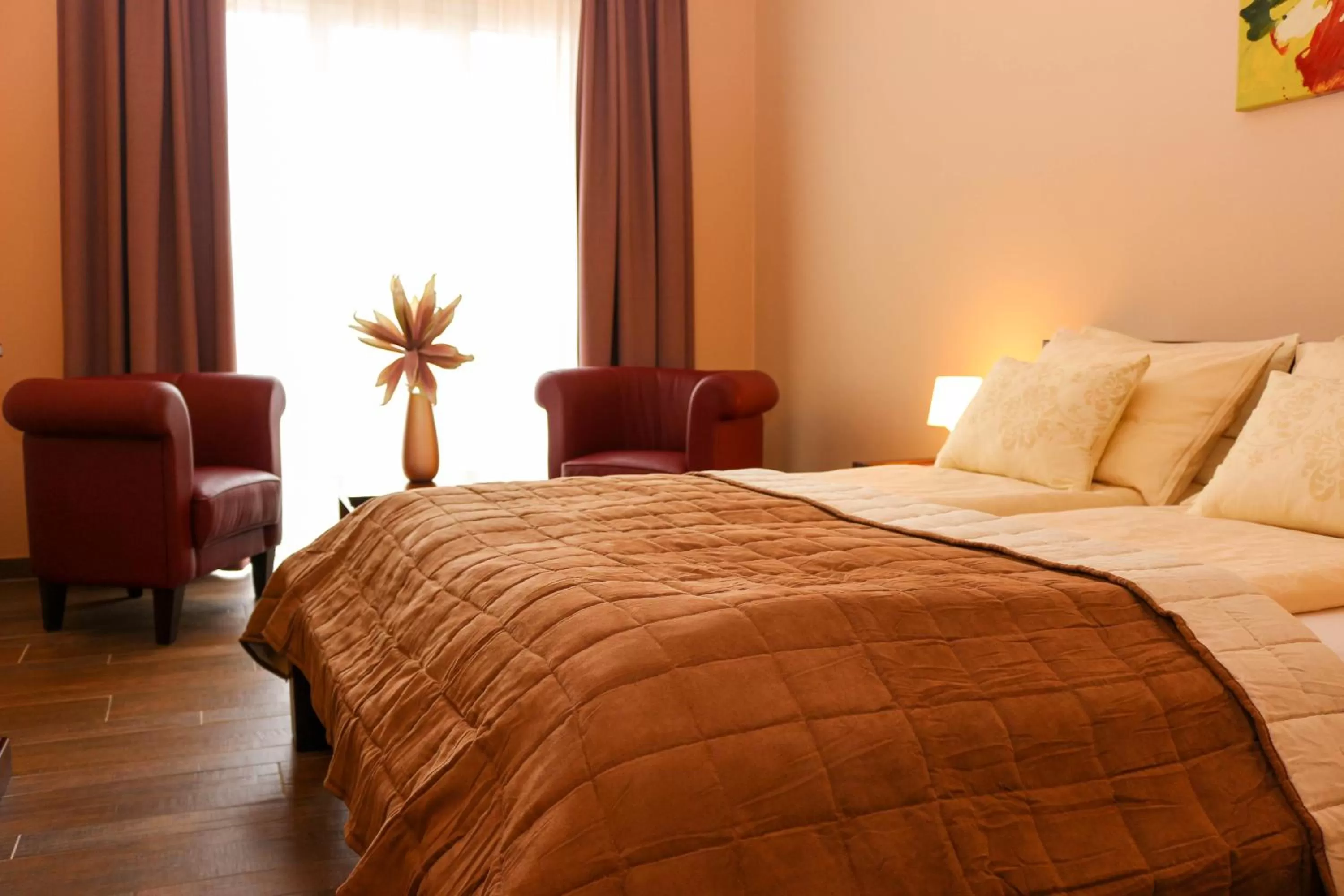 Photo of the whole room, Bed in Maya Panzio