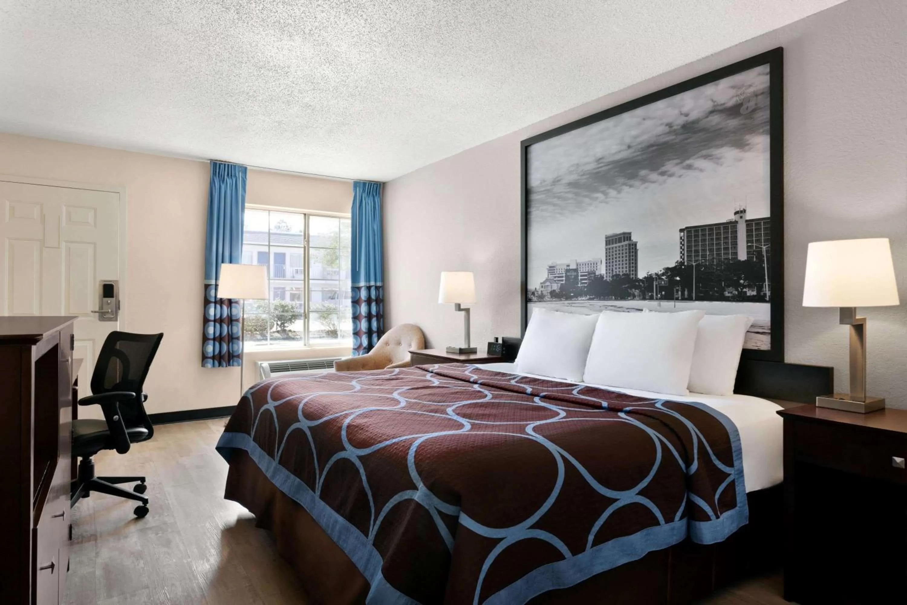 Photo of the whole room, Bed in Super 8 by Wyndham Gulfport Airport NW Near Biloxi