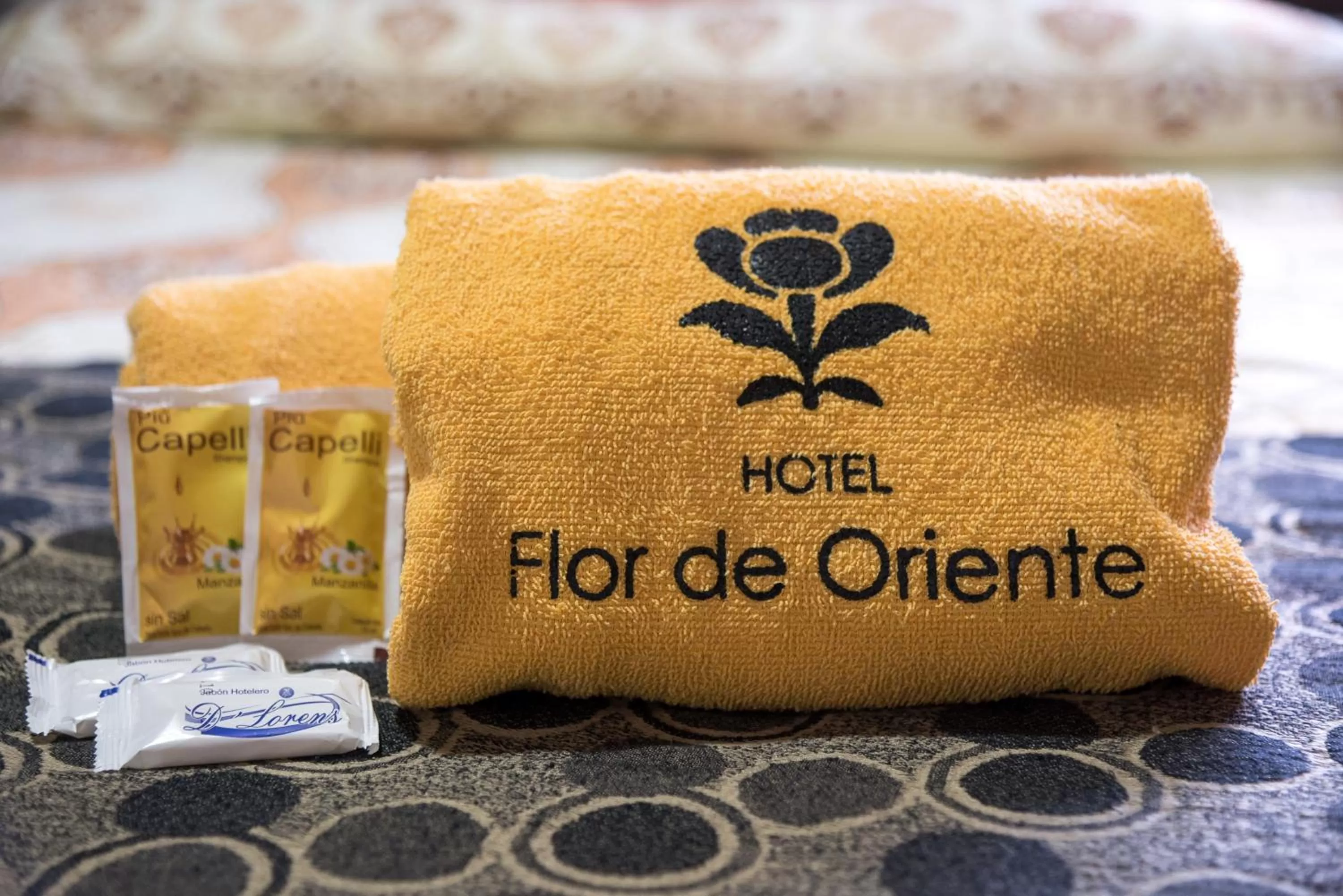 Property Logo/Sign in Hotel Flor de Oriente