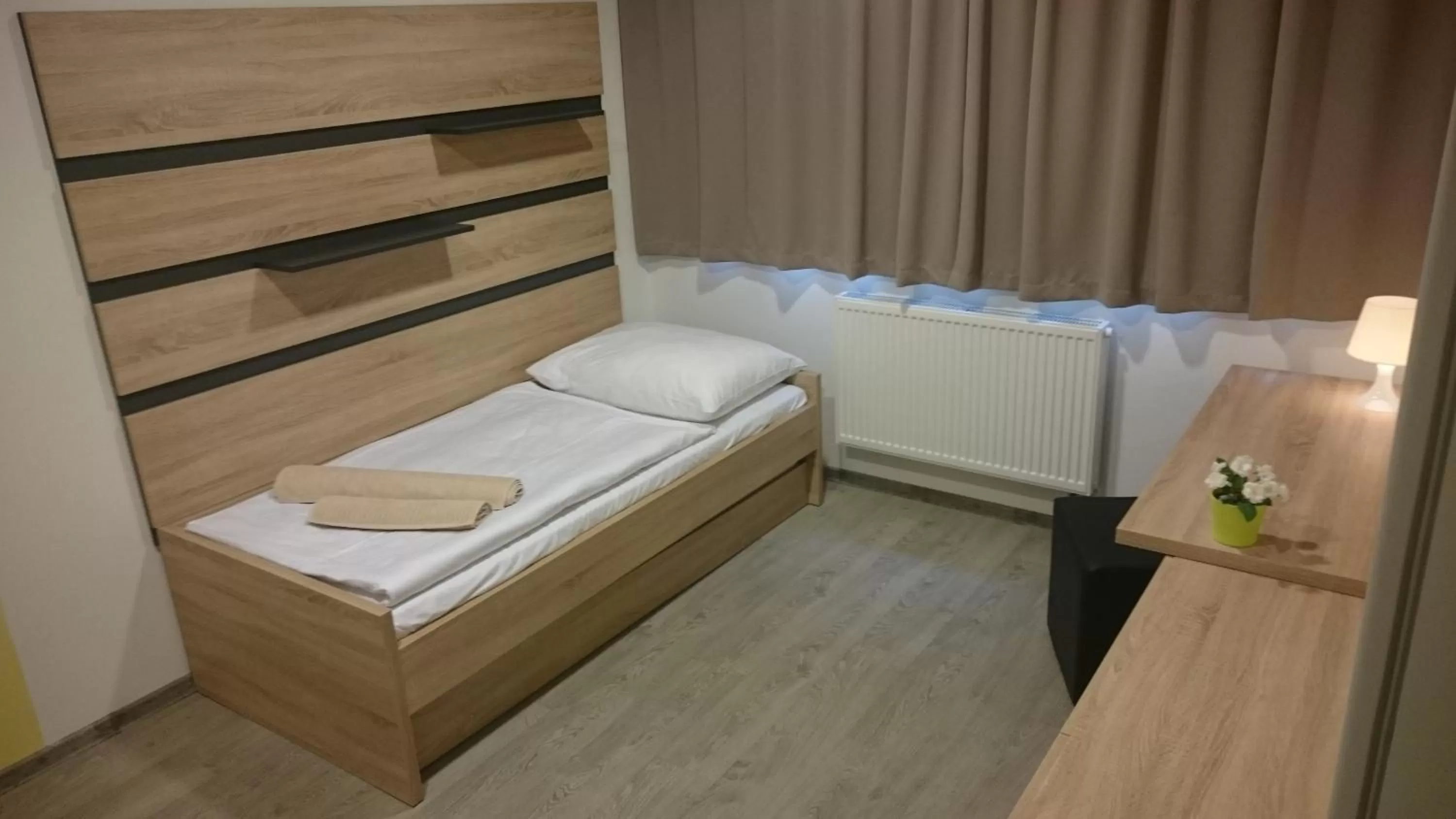 Photo of the whole room, Bed in TaM Autohof Malacky